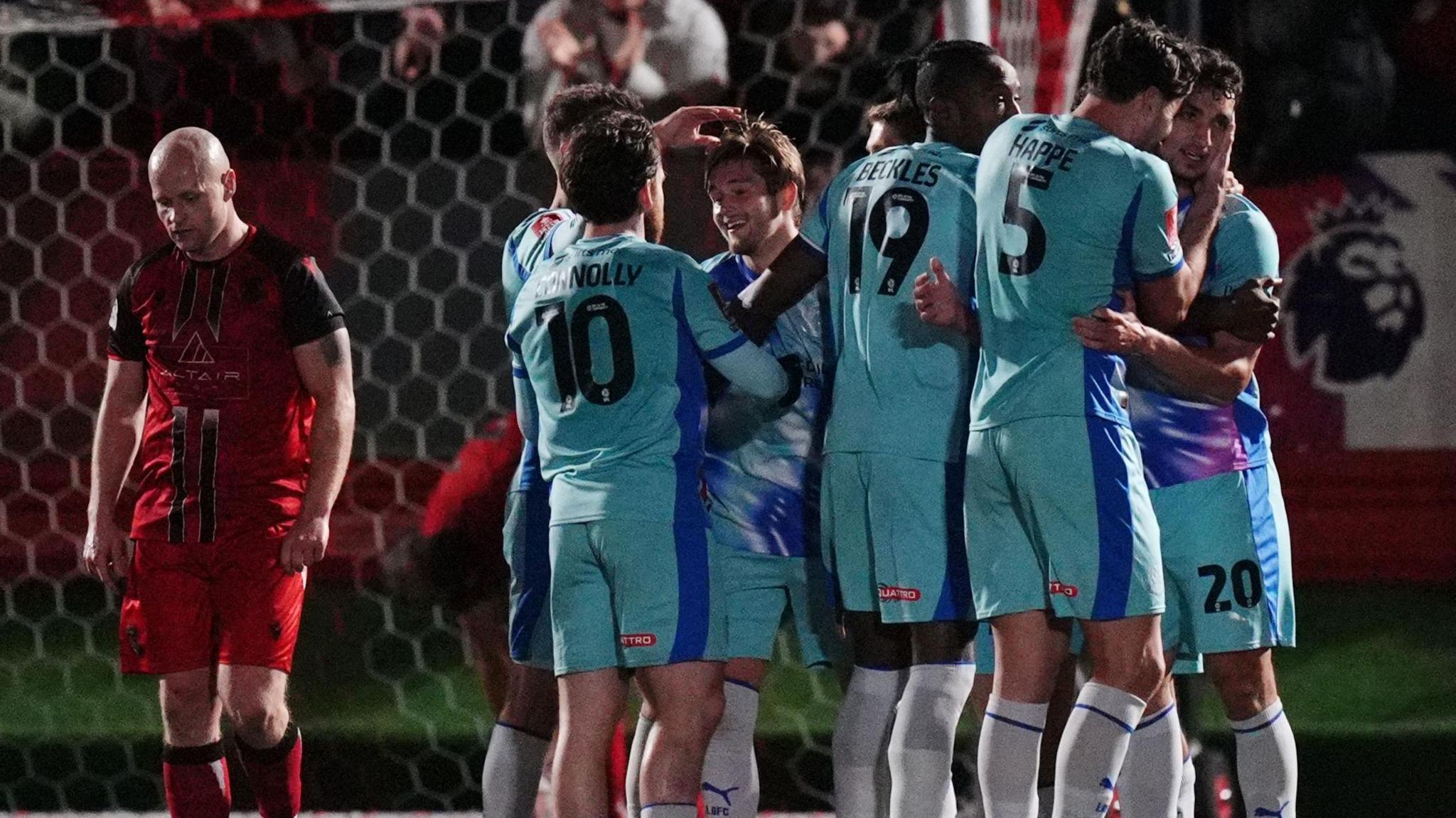 Leyton Orient players celebrate their goal at Tamworth