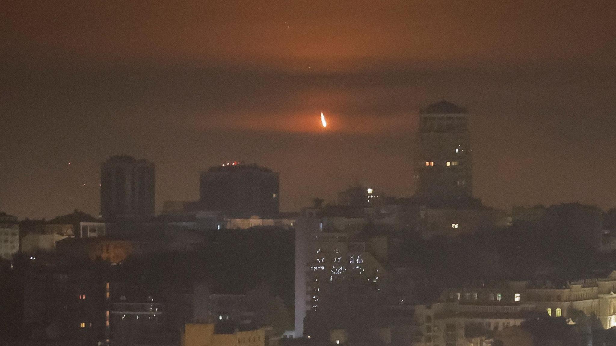 A drone is seen over the sky in Kyiv