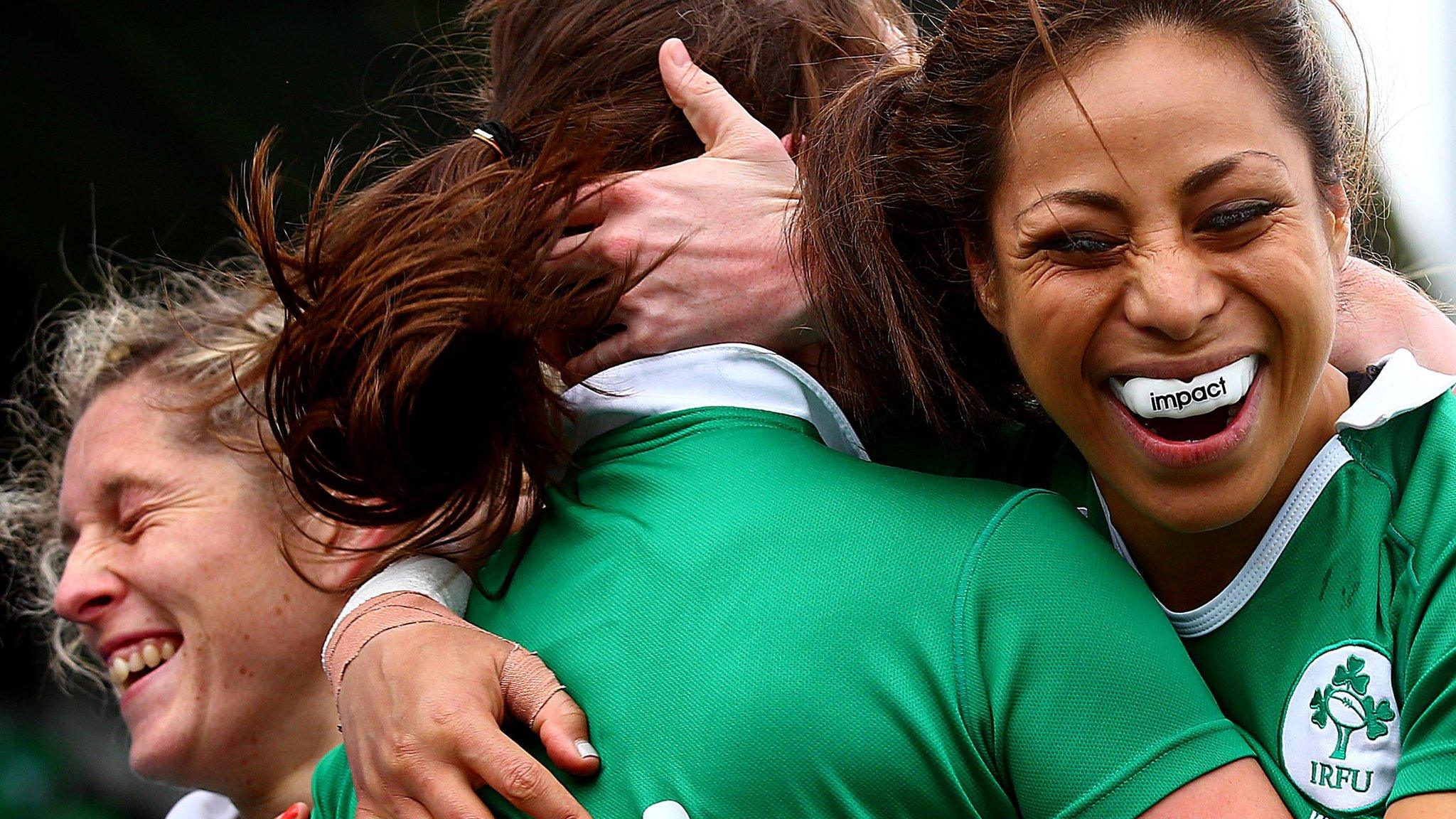 Ireland's Sene Naoupu congratulates Liz Burke on scoring the second try of the game