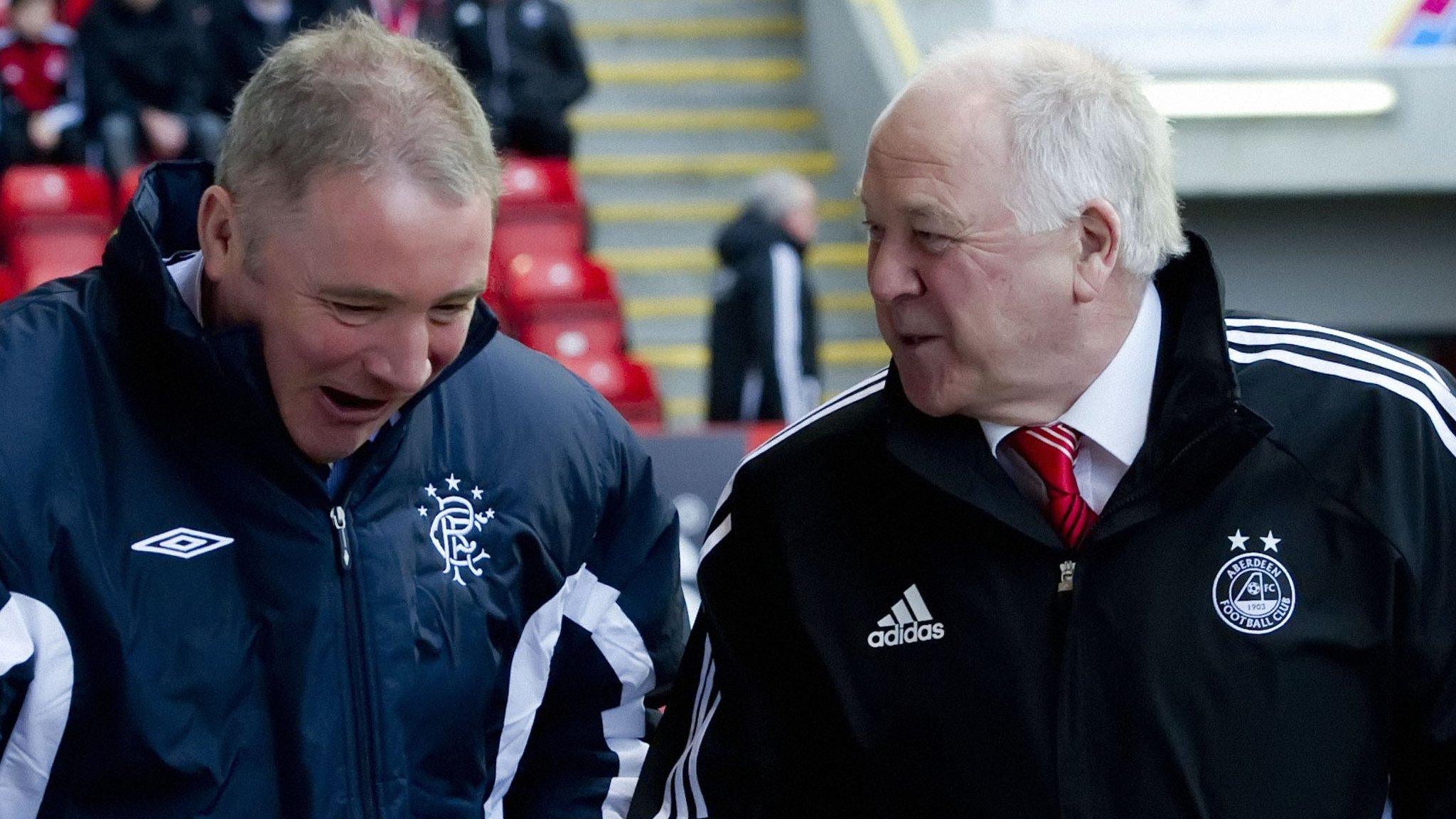 Ally McCoist chats to Craig Brown in 2011, when they were managers of Rangers and Aberdeen respectively