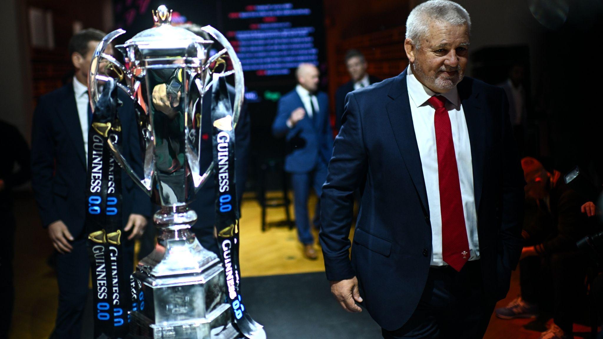 Warren Gatland walks passed the Six Nations trophy at the 2025 launch in Rome