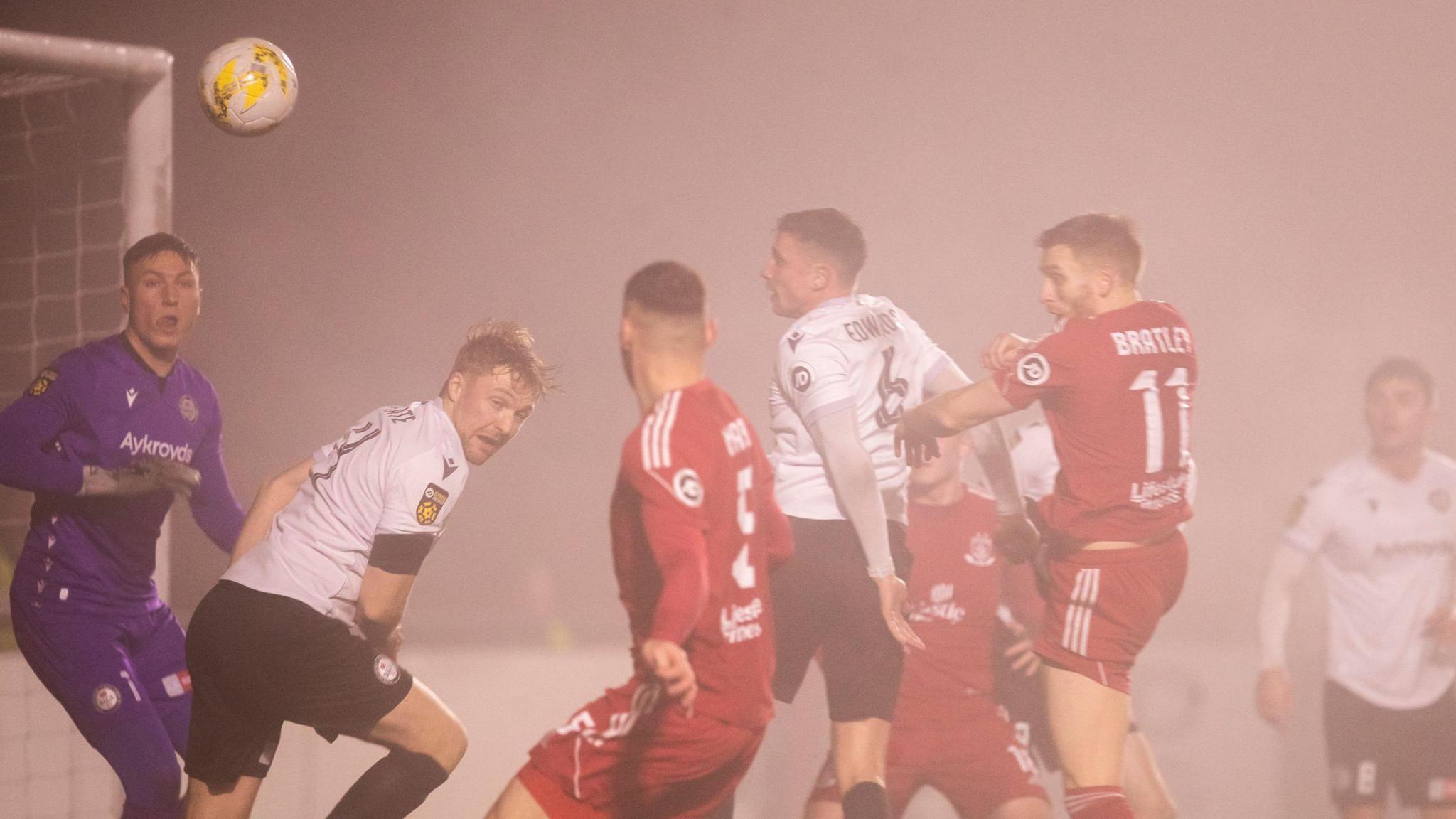 Ben Nash scores Connah's Quay's third goal against Bala