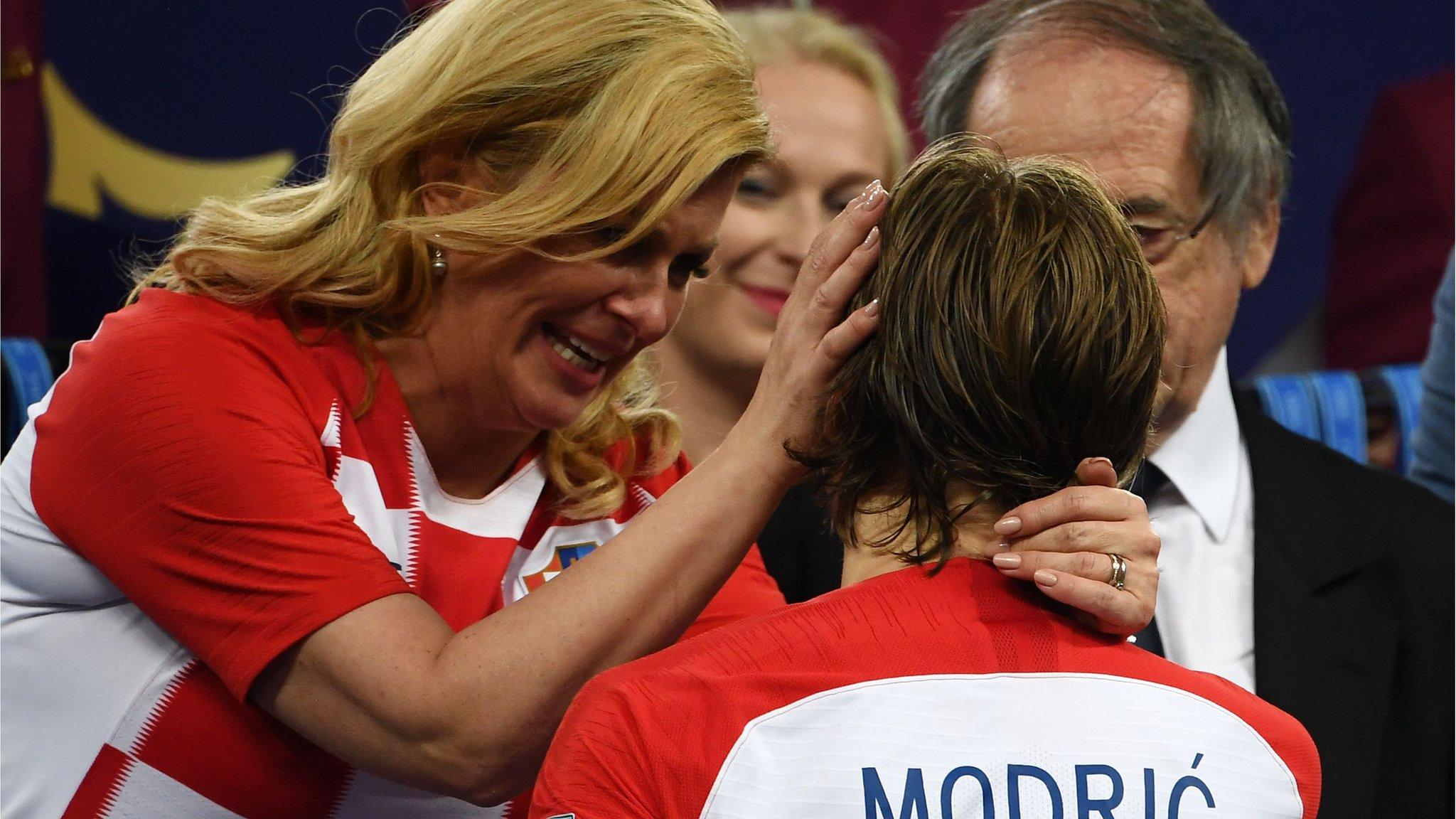 Croatia president Kolinda Grabar-Kitarovic embraces Luka Modric after the World Cup final