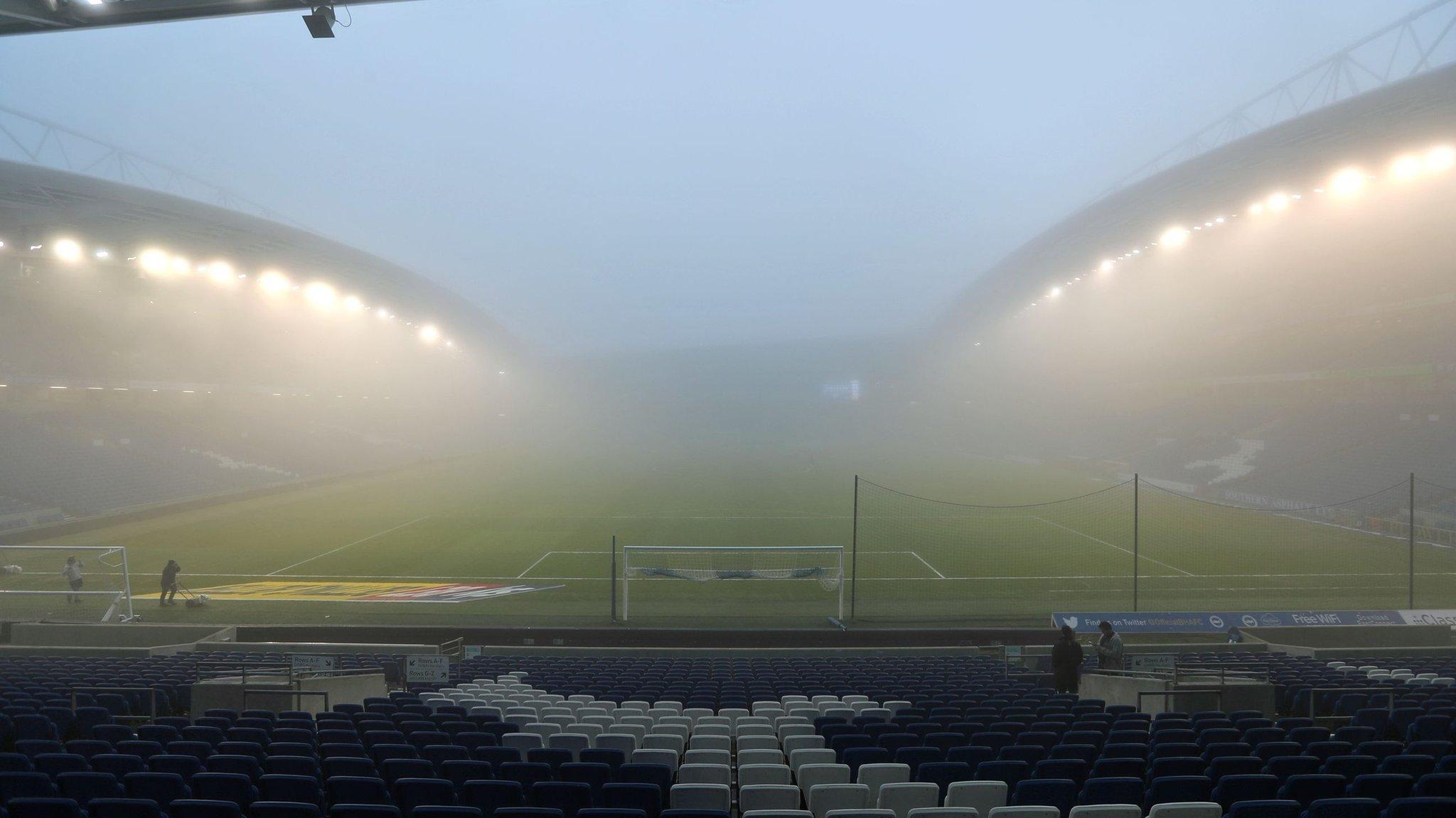 Brighton's AMEX Stadium under fog