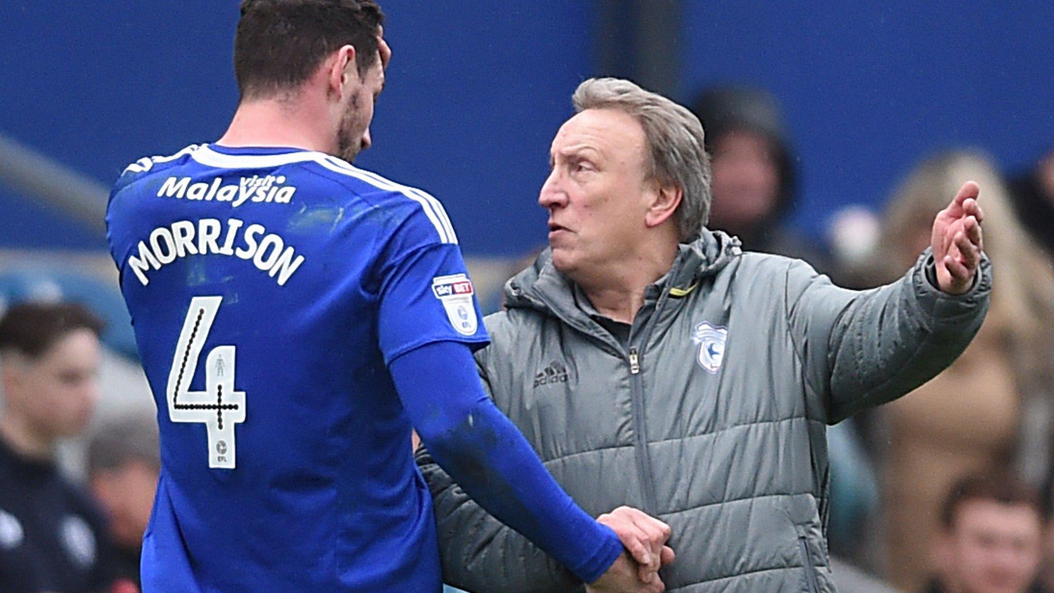 Neil Warnock (right) with Cardiff captain SDean Morrison