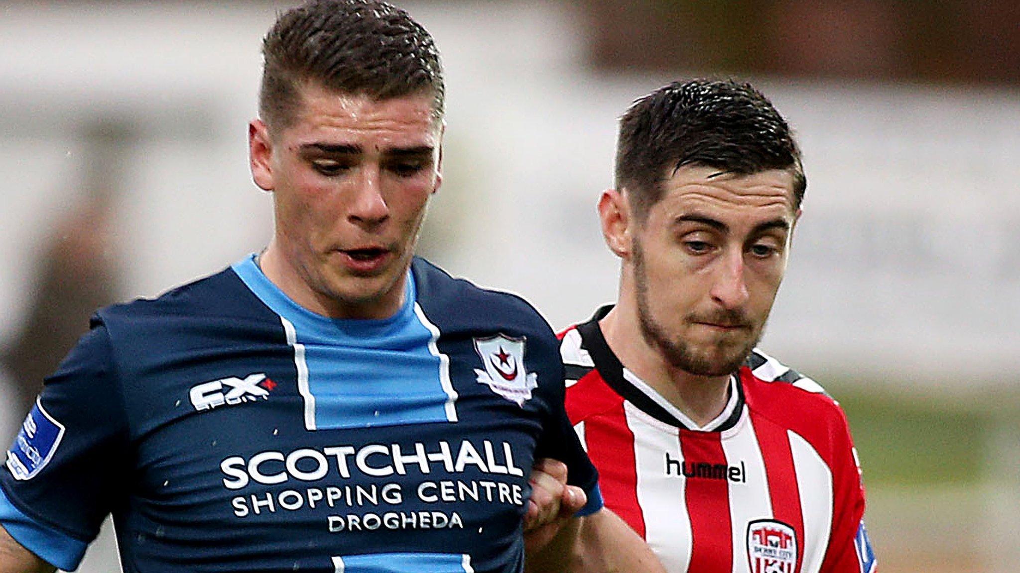 Drogheda's Sam O'Connor and Aaron Barry of Derry City