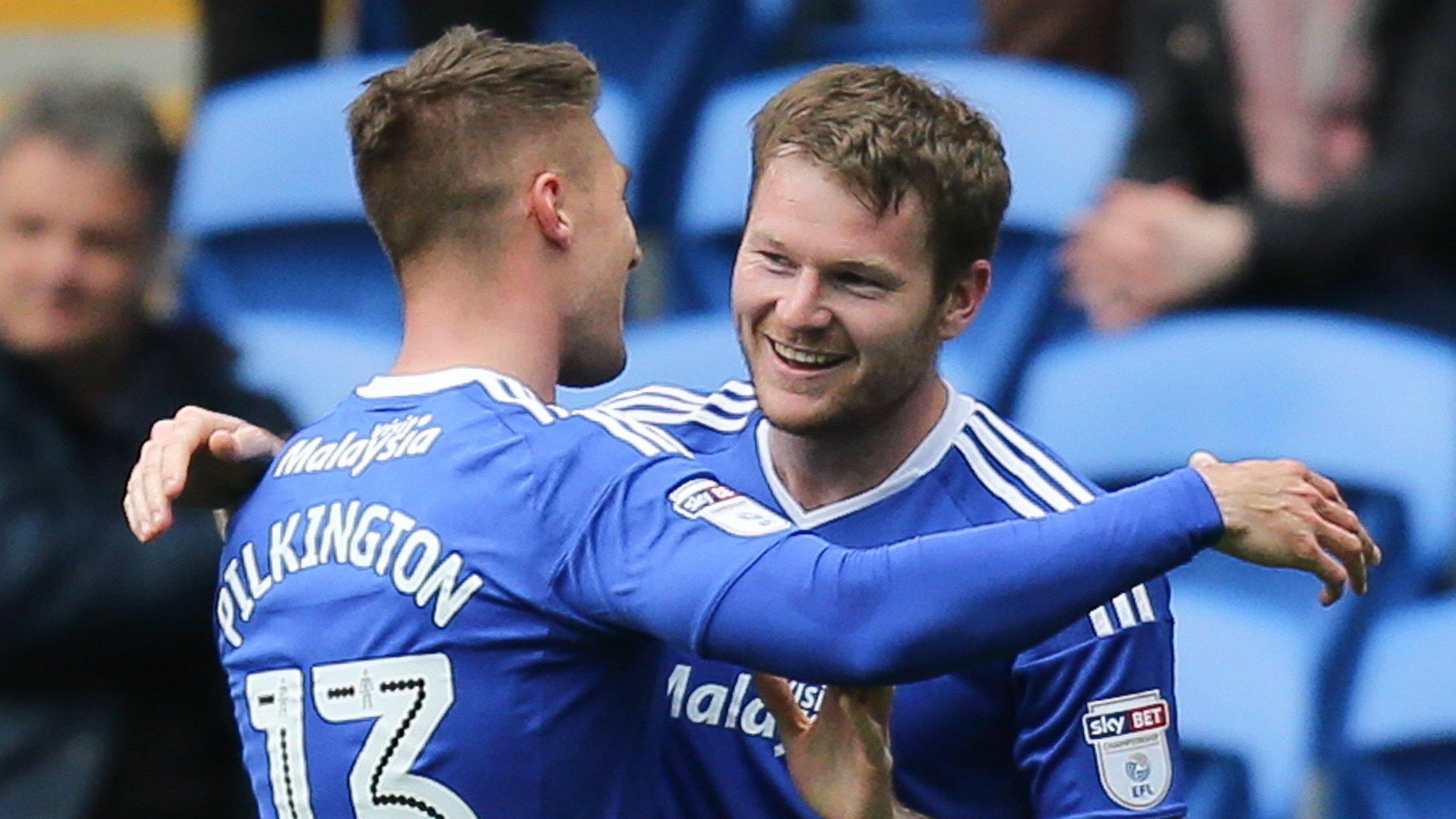 Cardiff City's Aron Gunnarsson celebrates his goal with Mark Pilkington