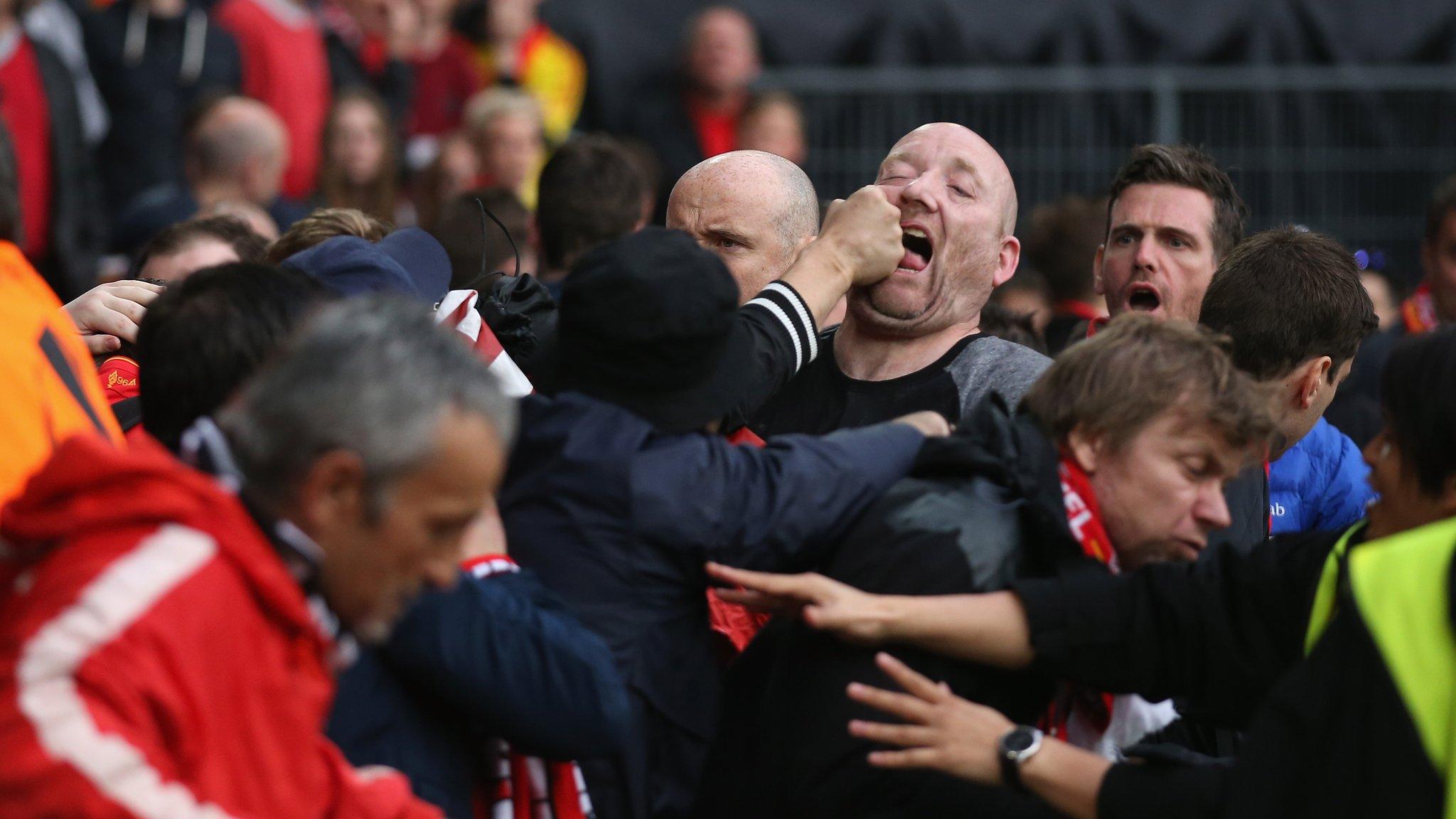 Liverpool and Sevilla fans clash