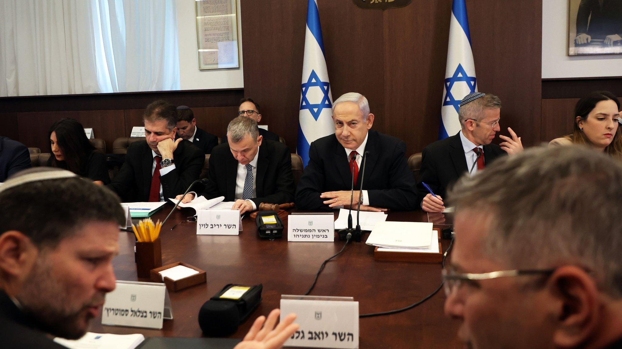 Israeli Prime Minister Benjamin Netanyahu (centre) chairs a weekly cabinet meeting in Jerusalem (9 July 2023)