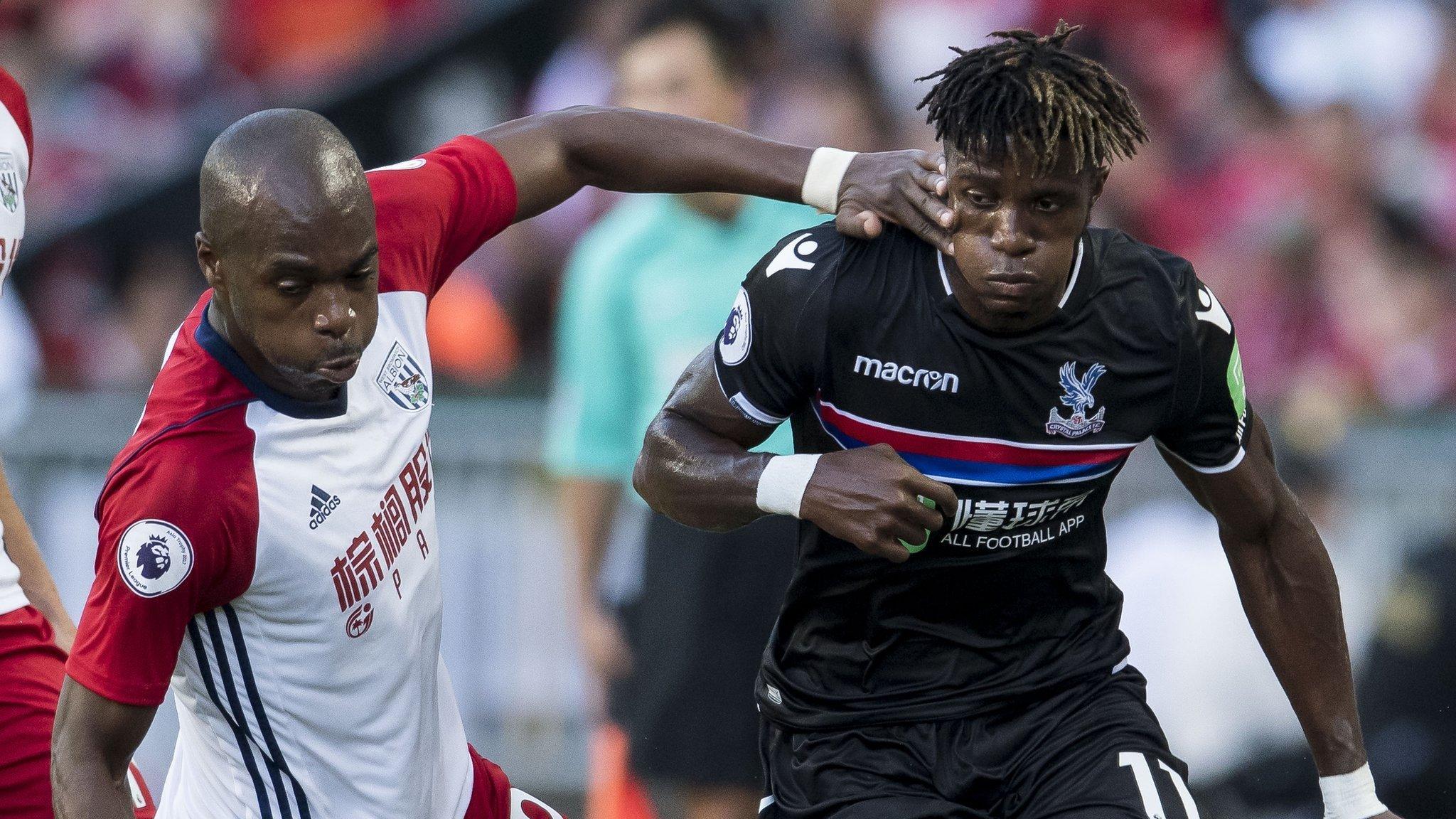 Allan Nyom (left) and Wilfried Zaha