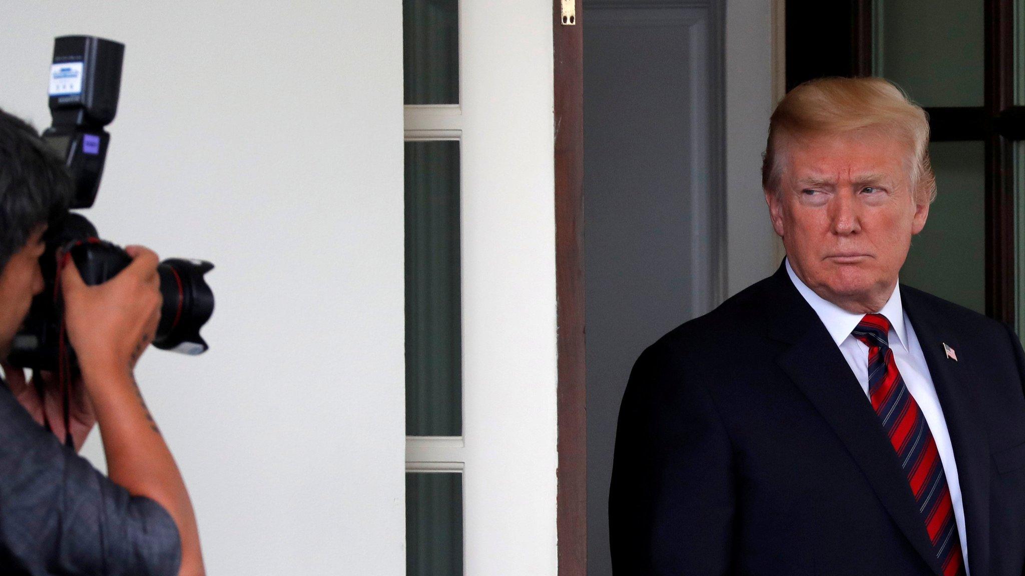 U.S. President Donald Trump looks at a photographer after a meeting with South Korea"s President Moon Jae-In at the White House in Washington, U.S., May 22, 2018.