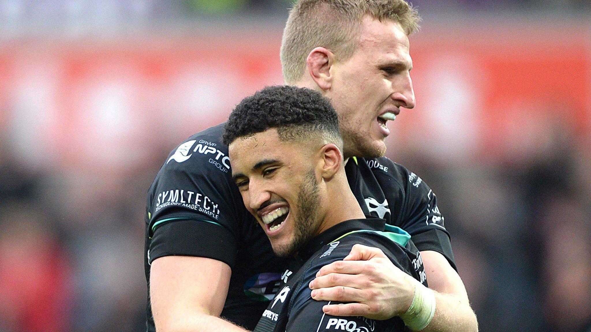 Keelan Giles is congratulated by team-mate Ben John after scoring his second try against Dragons