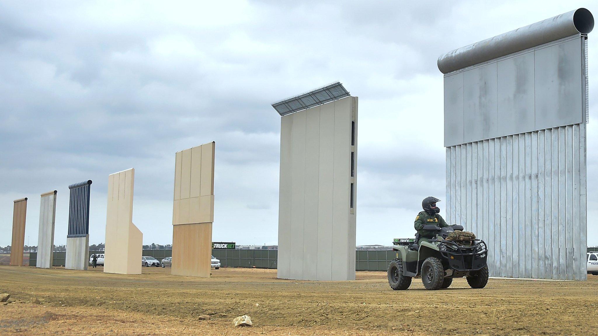 File image of a border patrol officer riding past prototypes of US President Donald Trump's proposed border wall in San Diego, California. November 1, 2017