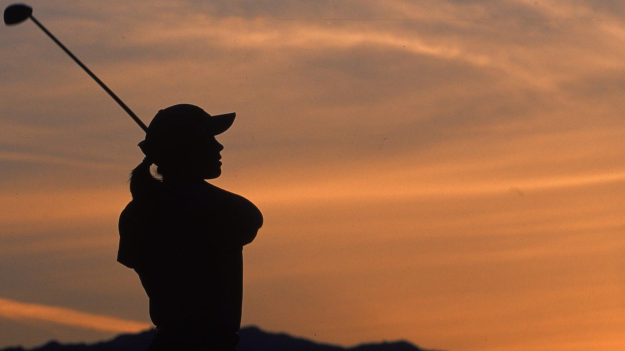 women golfer silhouette