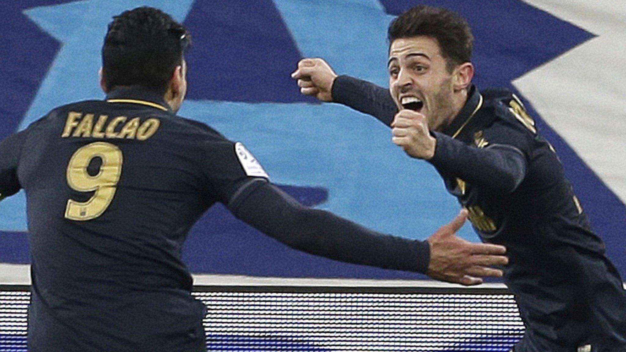 Monaco's players celebrate scoring against Marseille