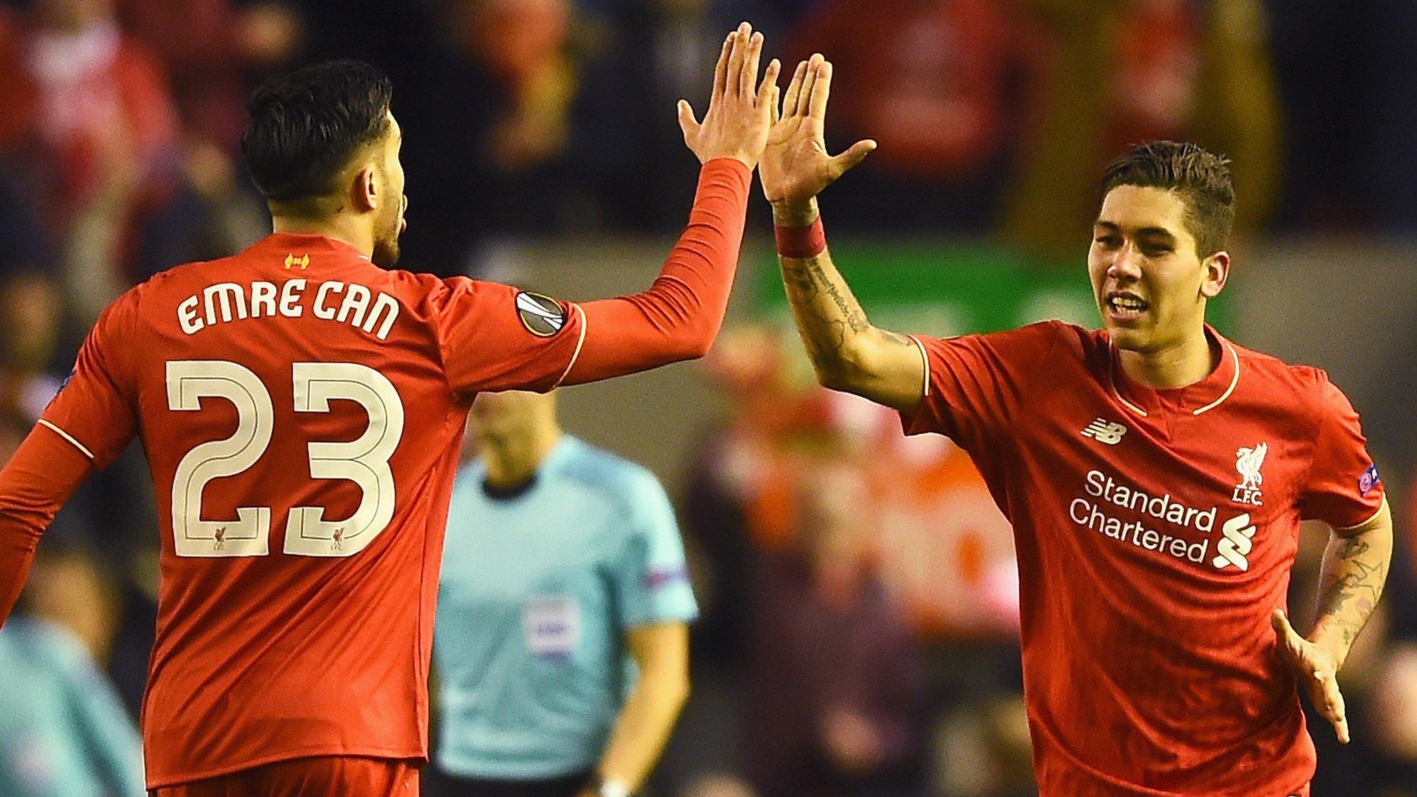 Roberto Firminho (right) celebrates his goal with Emre Can