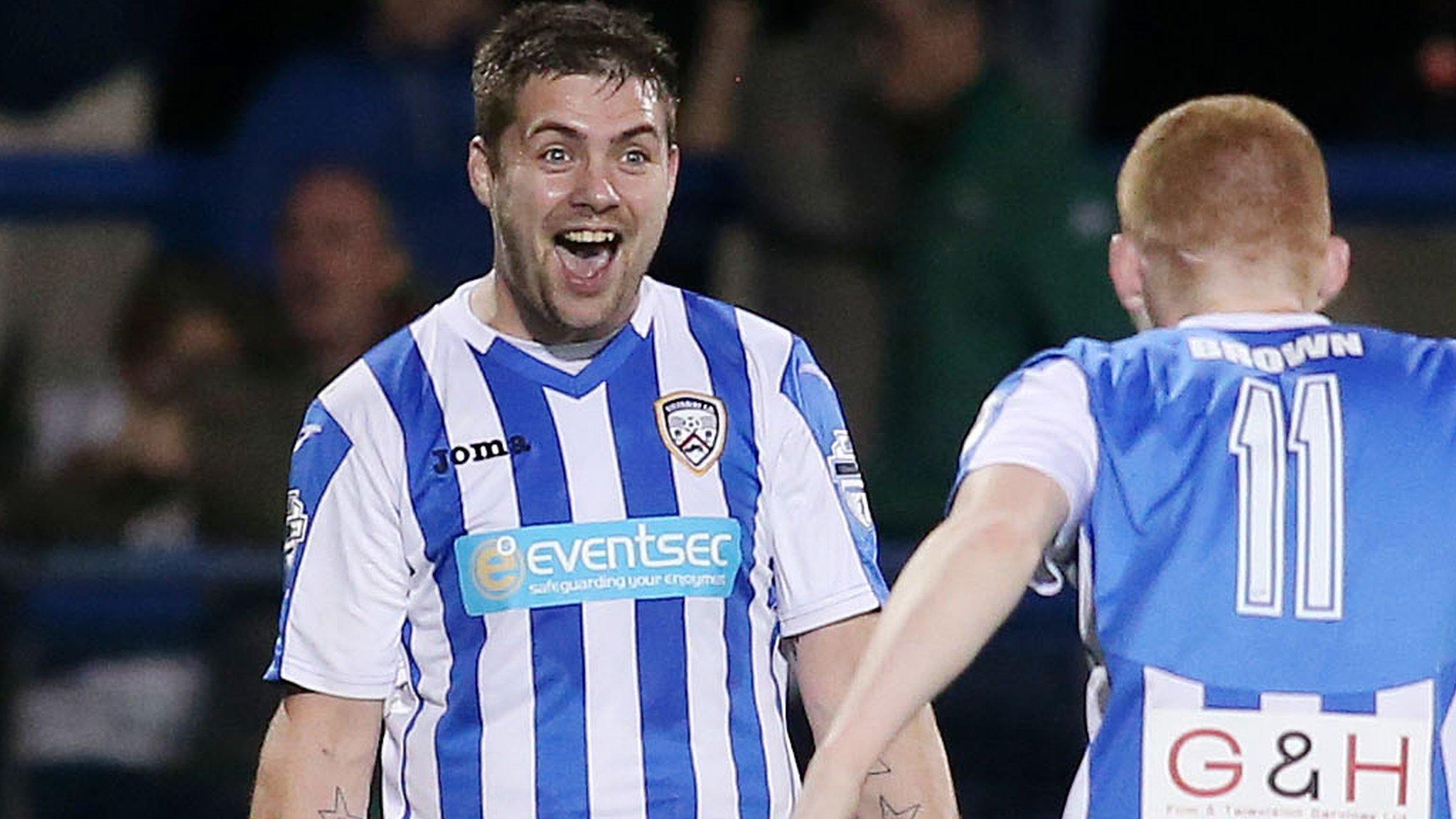 Coleraine striker James McLaughlin celebrates after scoring against Glentoran