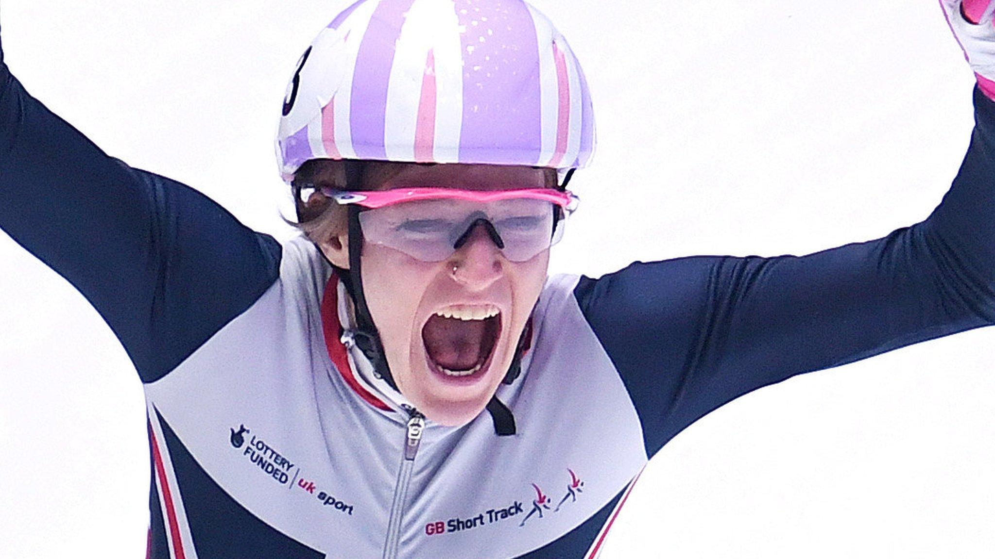 Elise Christie celebrates winning 1000m gold