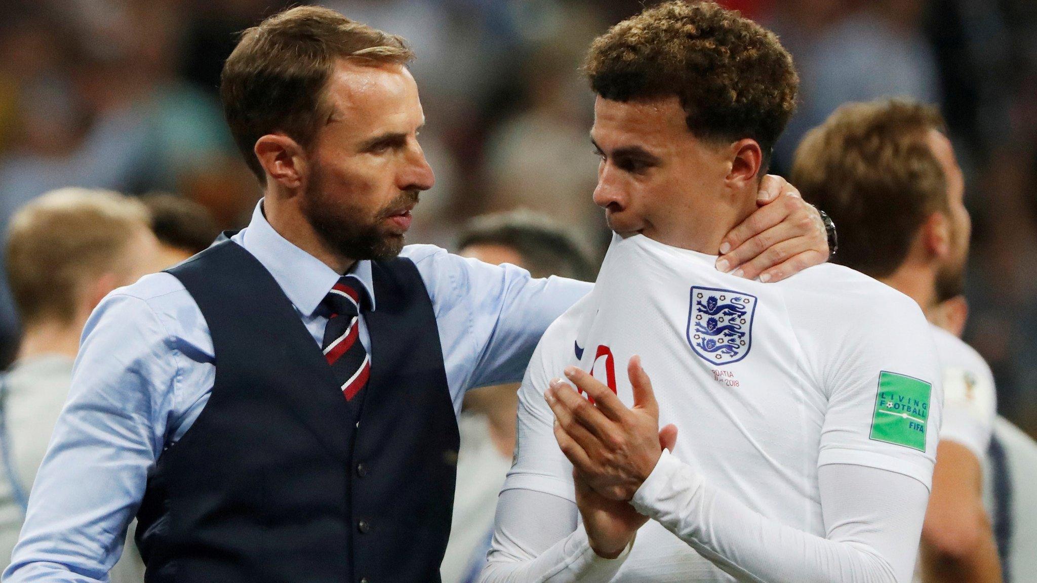 Gareth Southgate and Dele Alli standing together after England's World Cup loss