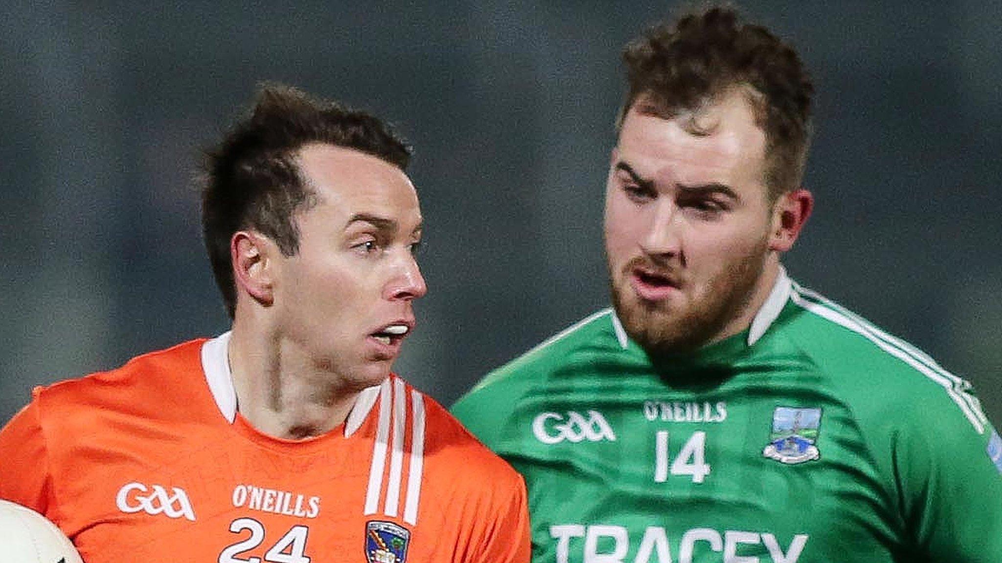 Armagh's Aaron McKay and Fermanagh's Sean Quigley