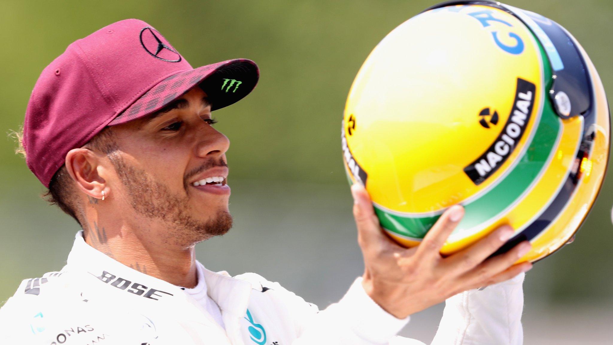 Lewis Hamilton with Ayrton Senna's helmet