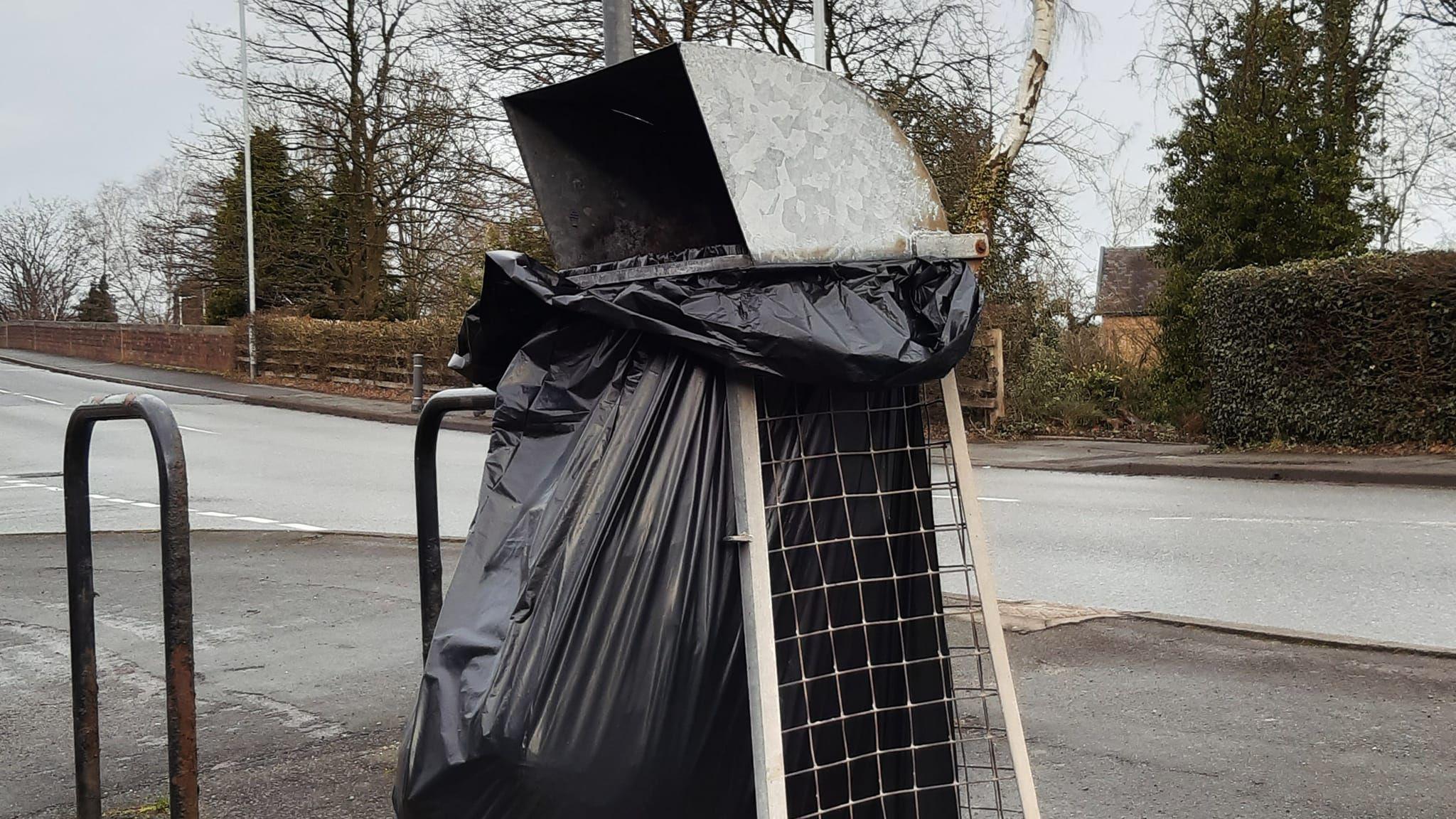 Metal-topped bin