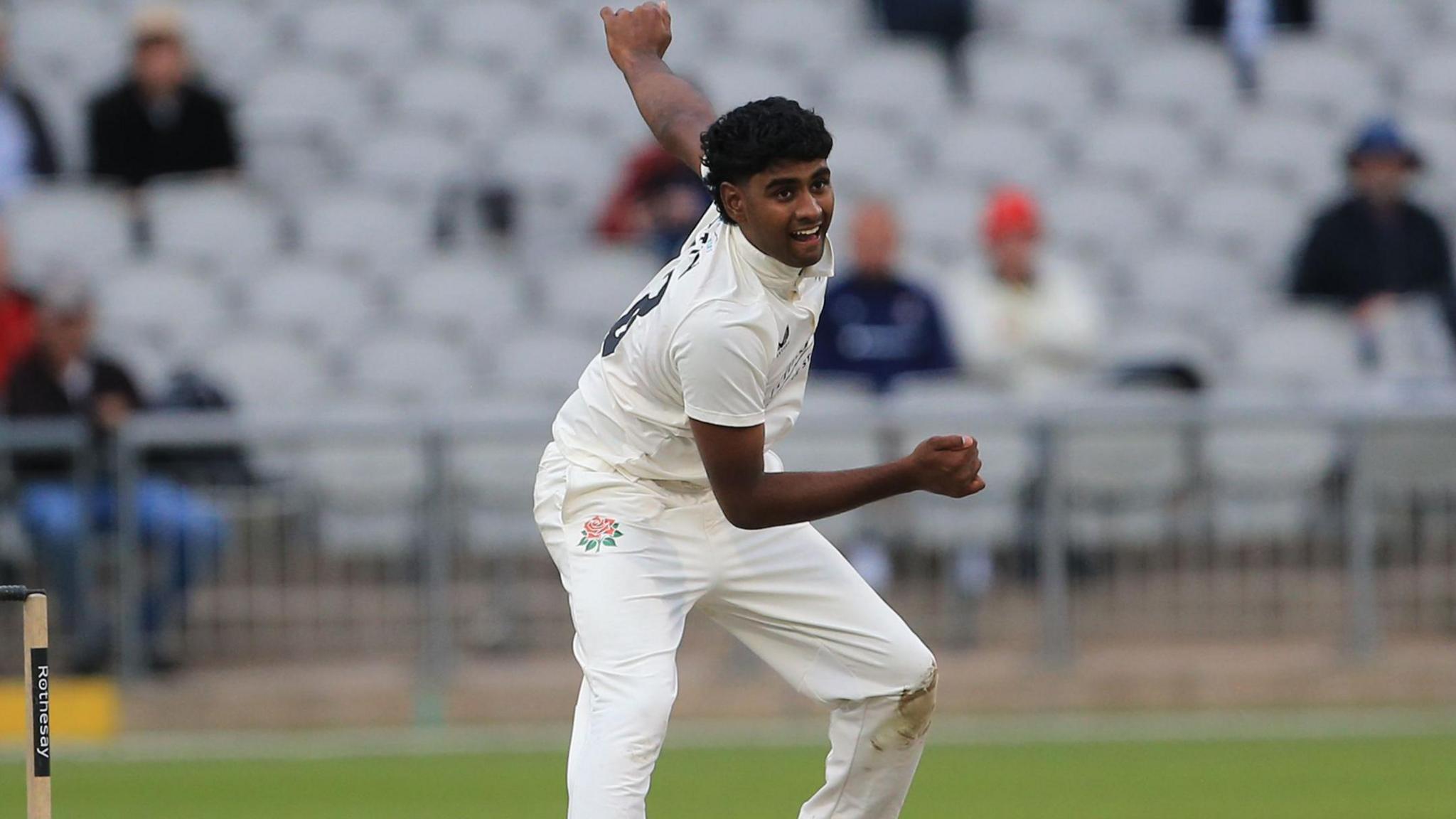 Arav Shetty bowling off spin for Lancashire in the County Championship 