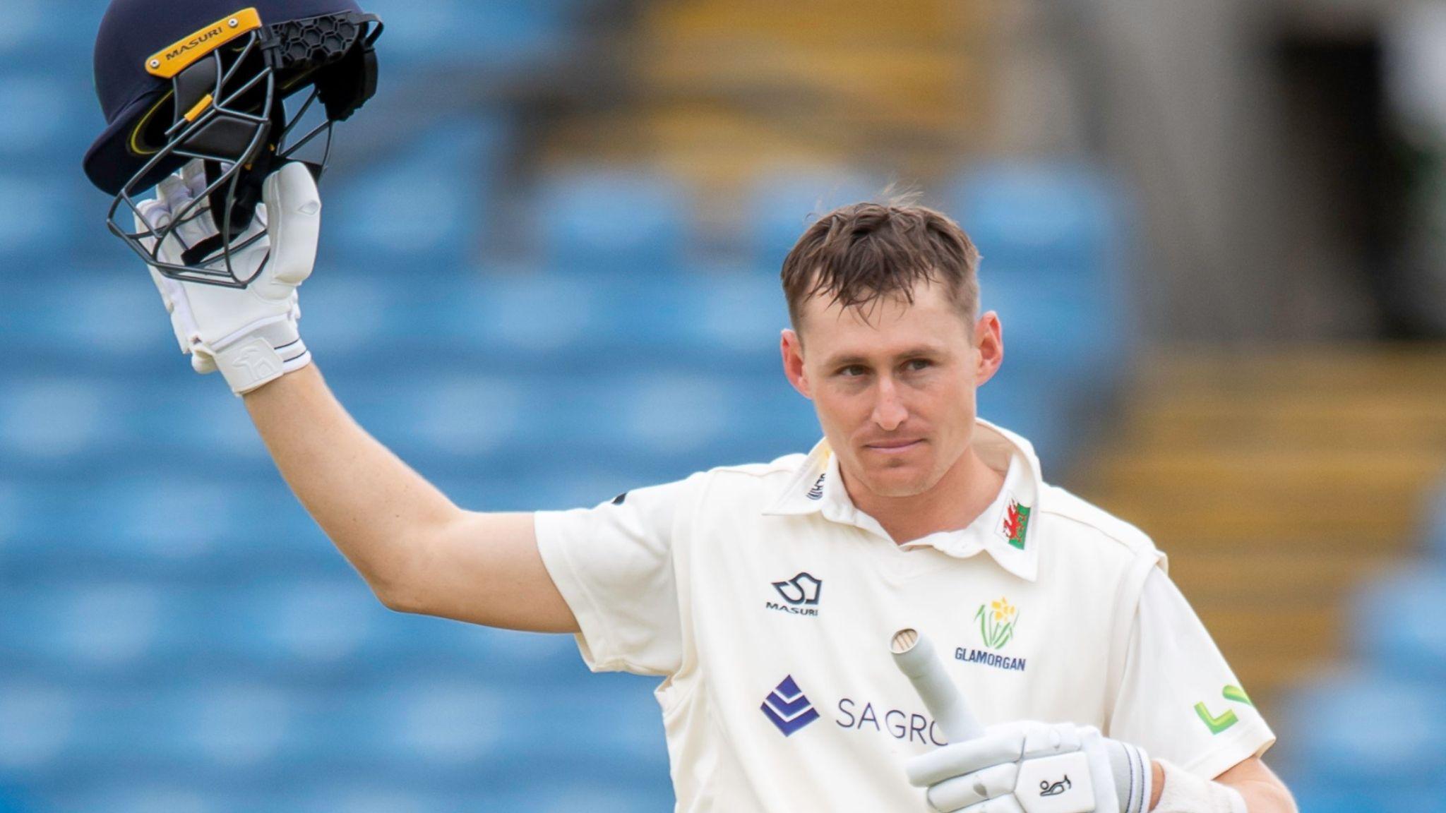 Marnus Labuschagne holds his helmet aloft as an acknowledgement to the crowd