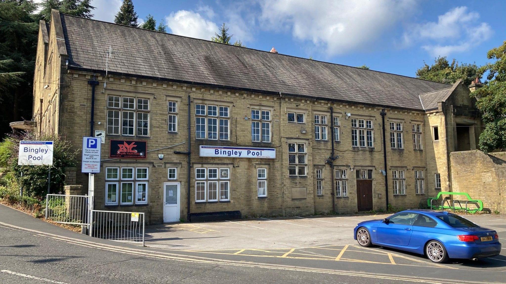 A side view of the Bingley Pool building in the town centre