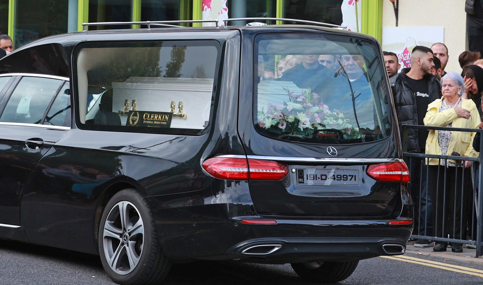 The hearse carrying the remains of Dlava Mohamed