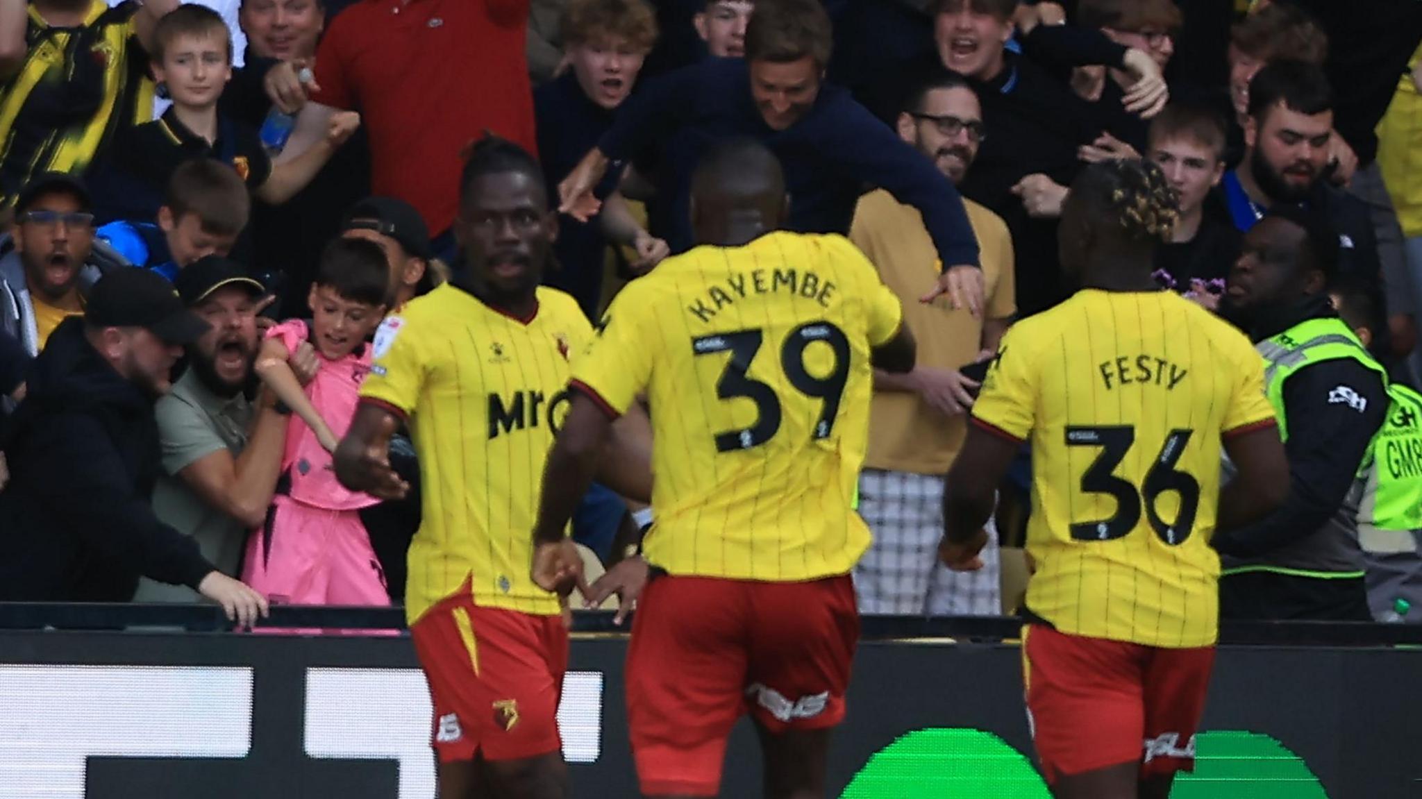 Watford players congratulate Tom Dele-Bashiru for his second-half equaliser against Coventry City