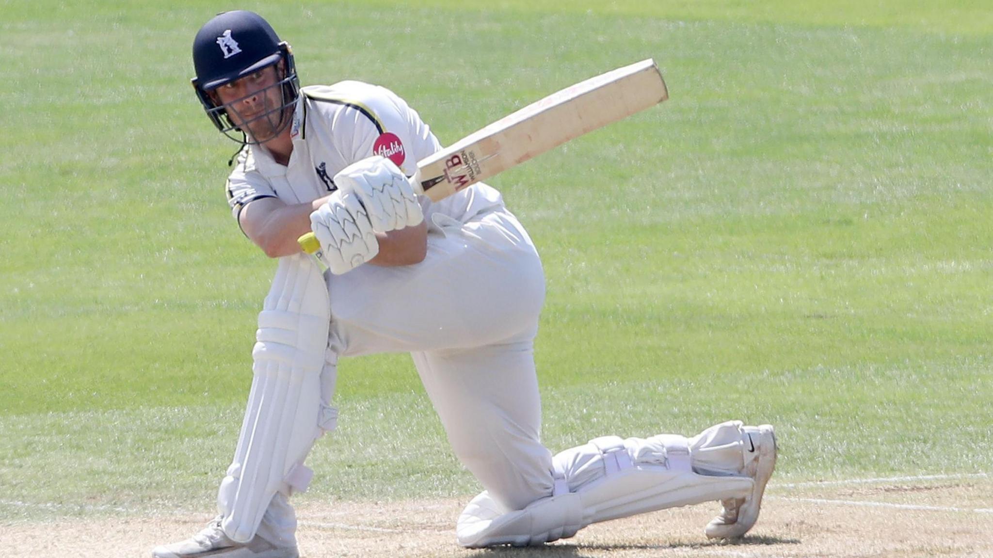 Warwickshire's Michael Burgess in action