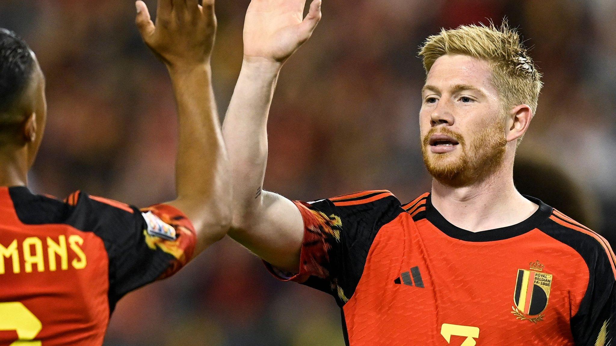 Kevin De Bruyne (right) celebrates with Youri Tielemans