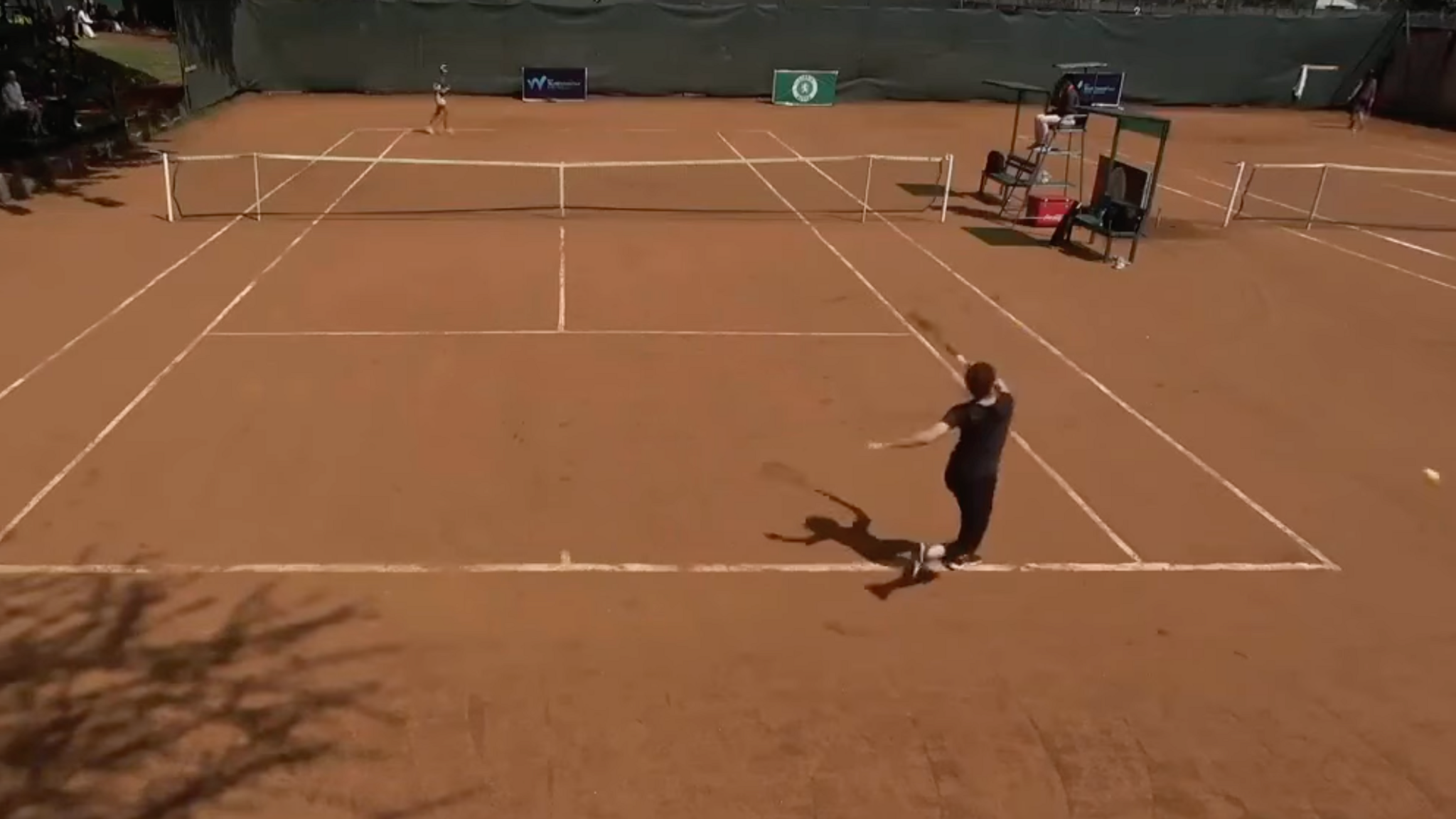 Hajar Abdelkader misses a return shot 