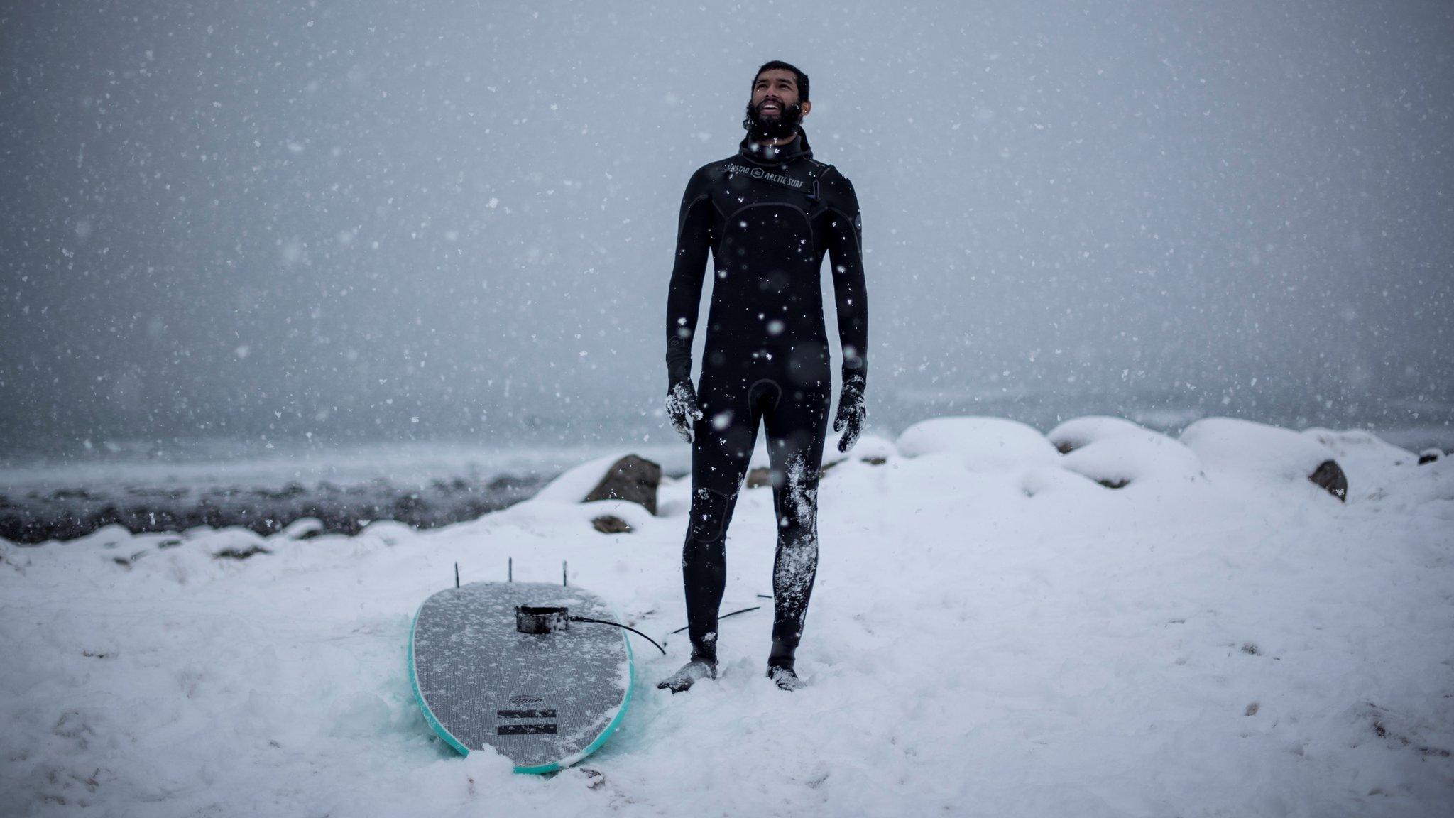 Leela Krischna from India takes a rest after a surfing session in March 2018 in Unstad, northern Norway, Lofoten islands, within the Arctic Circle. Air temperature was -13°C, water temperature 4°C.