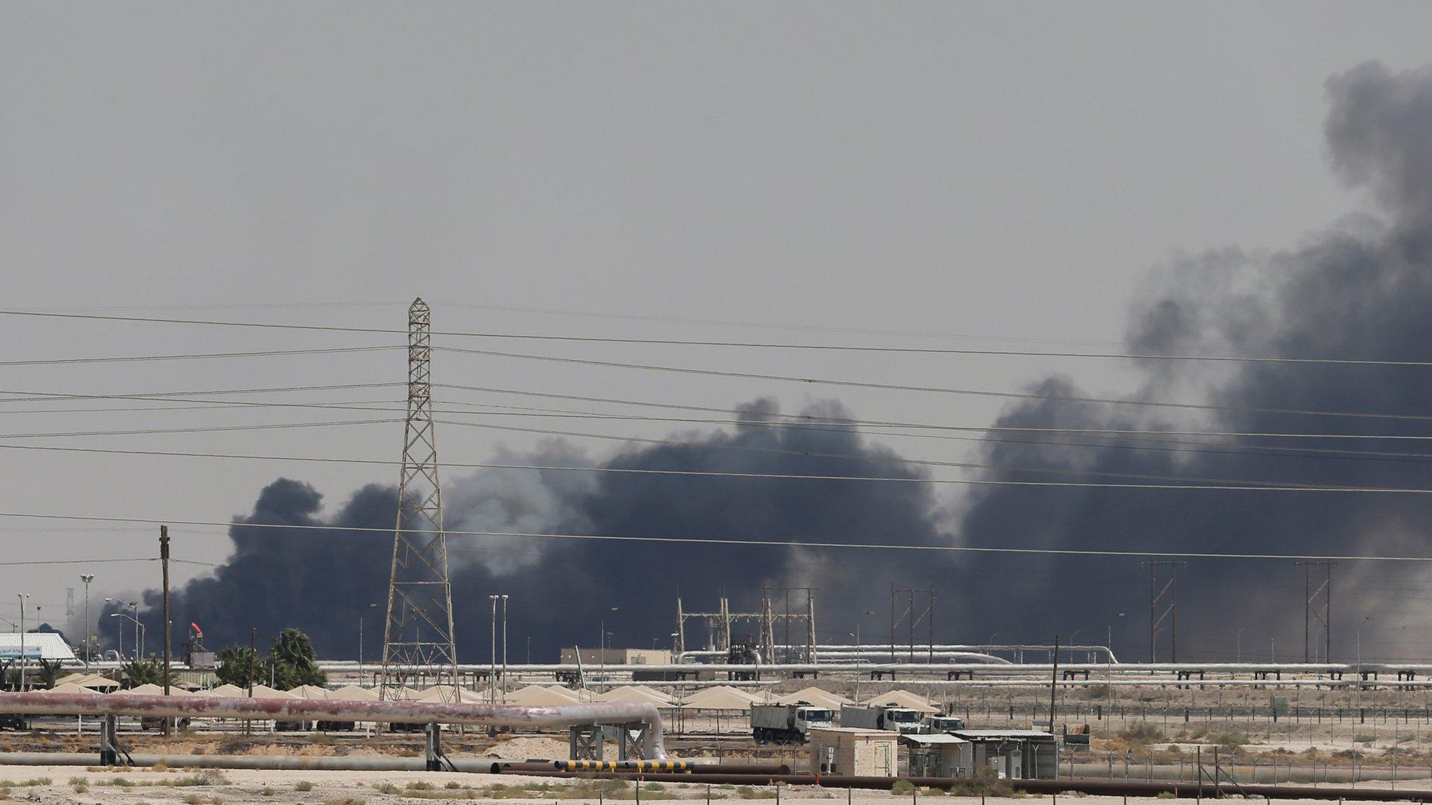 Smoke is seen following a fire at Aramco facility in the eastern city of Abqaiq