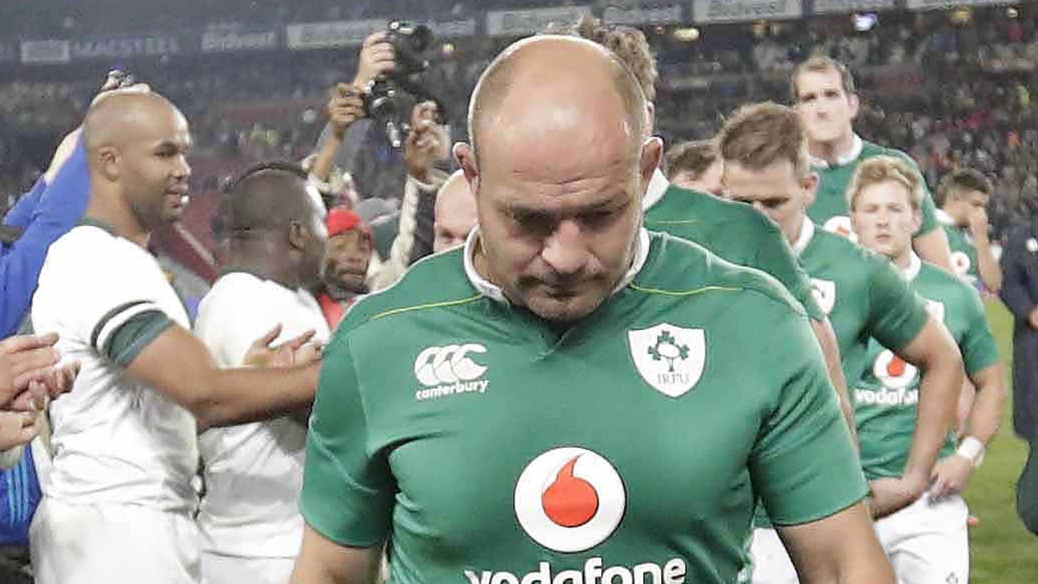 A dejected Rory Best leaves the pitch after the game