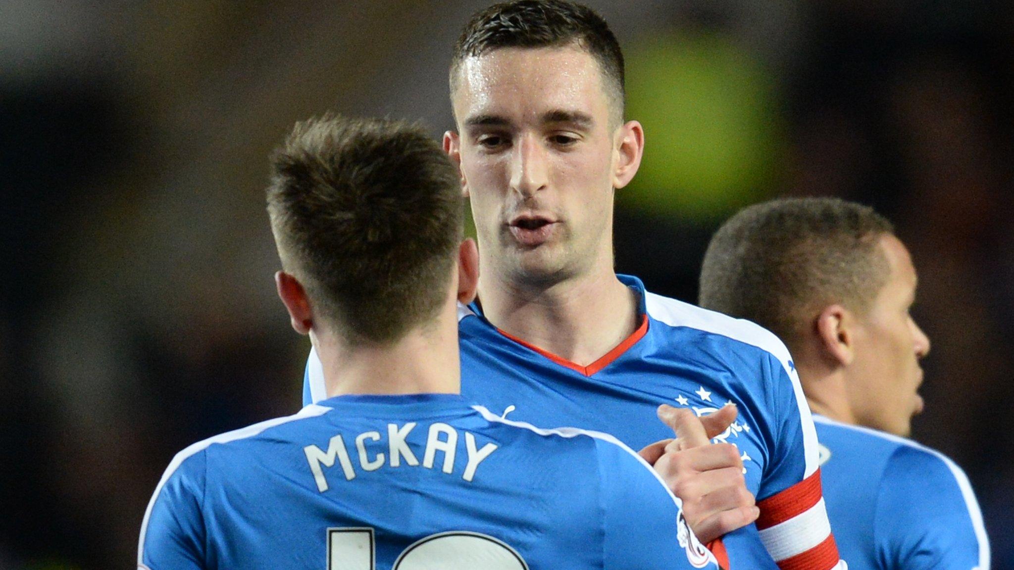 Rangers captain Lee Wallace (centre) congratulate Barrie McKay