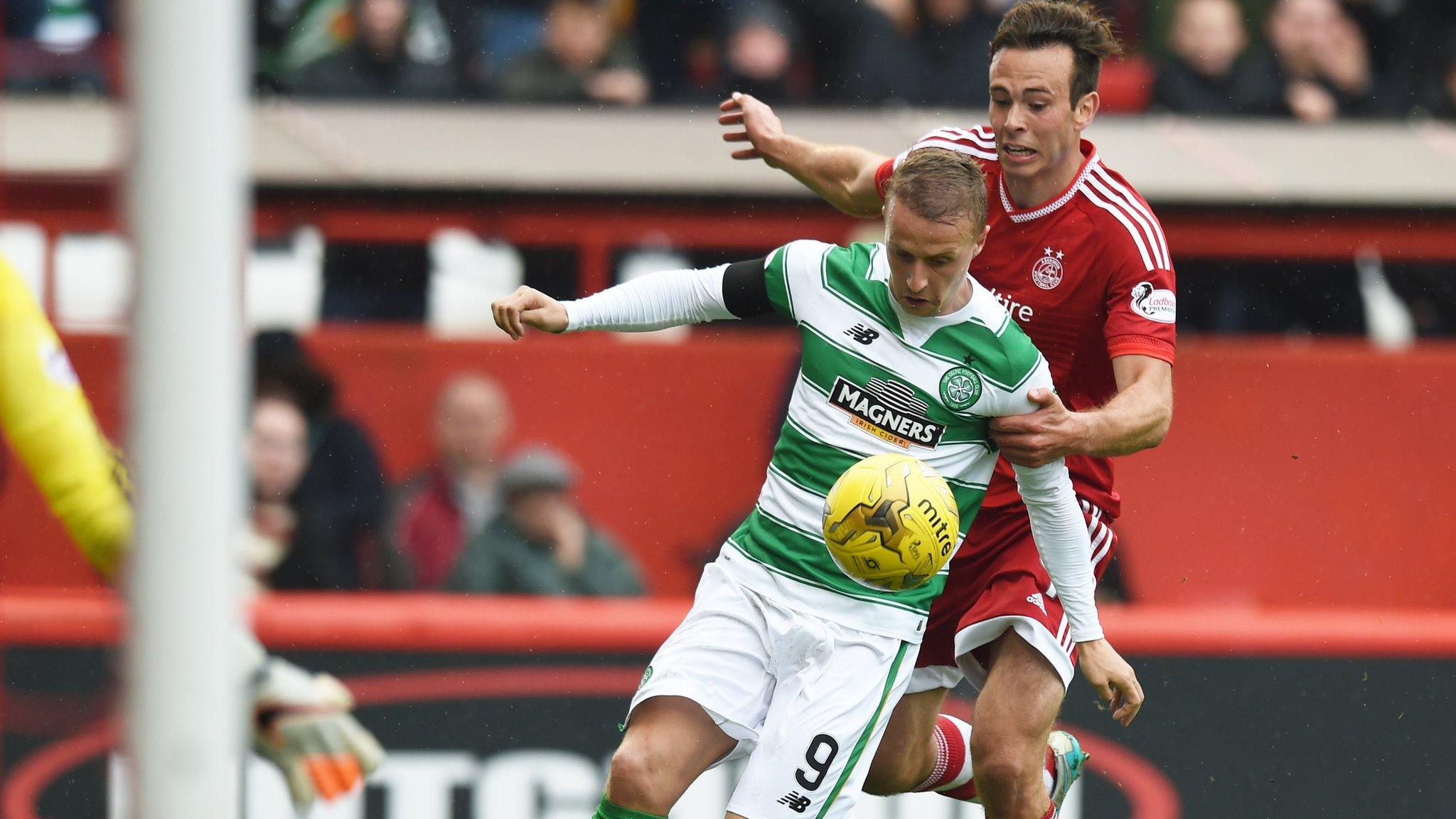 Aberdeen's Andrew Considine pulls back Leigh Griffiths to concede a penalty and incur a booking