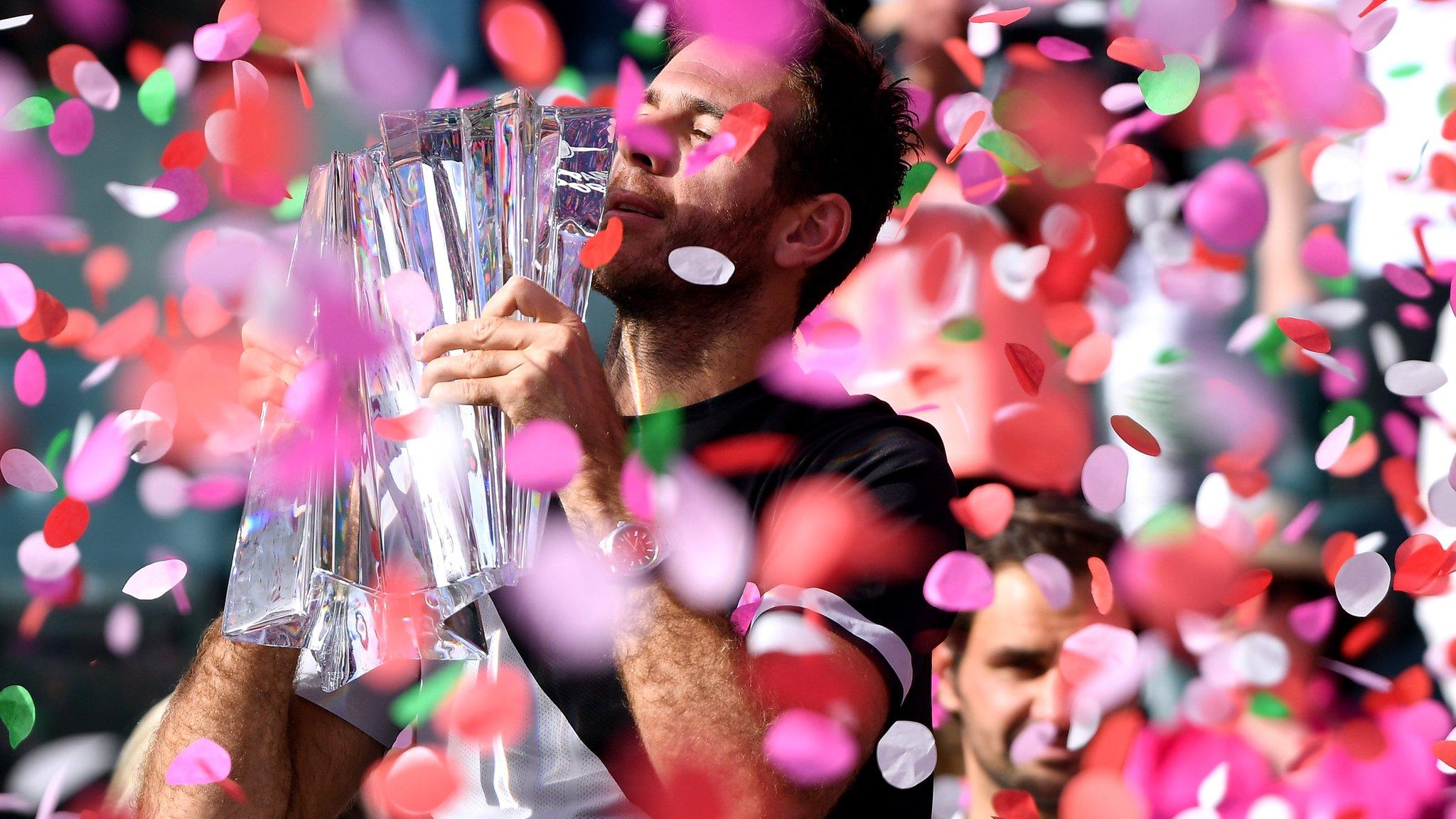 Juan Martin Del Potro of Argentina holds up the trophy after his victory over Roger Federer of Switzerland in the ATP final during the BNP Paribas Open at the Indian Wells Tennis Garden on March 18, 2018 in Indian Wells, California