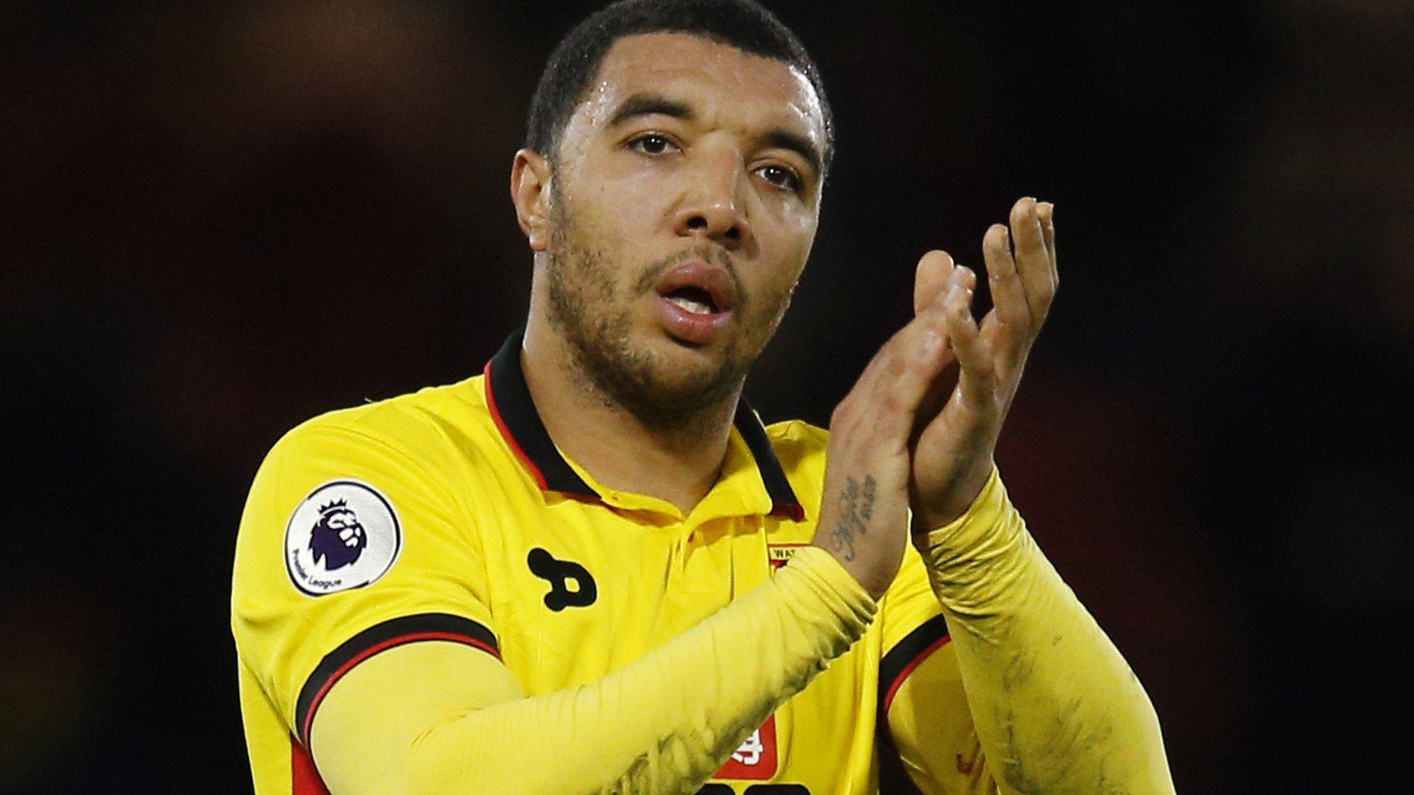 Troy Deeney applauds