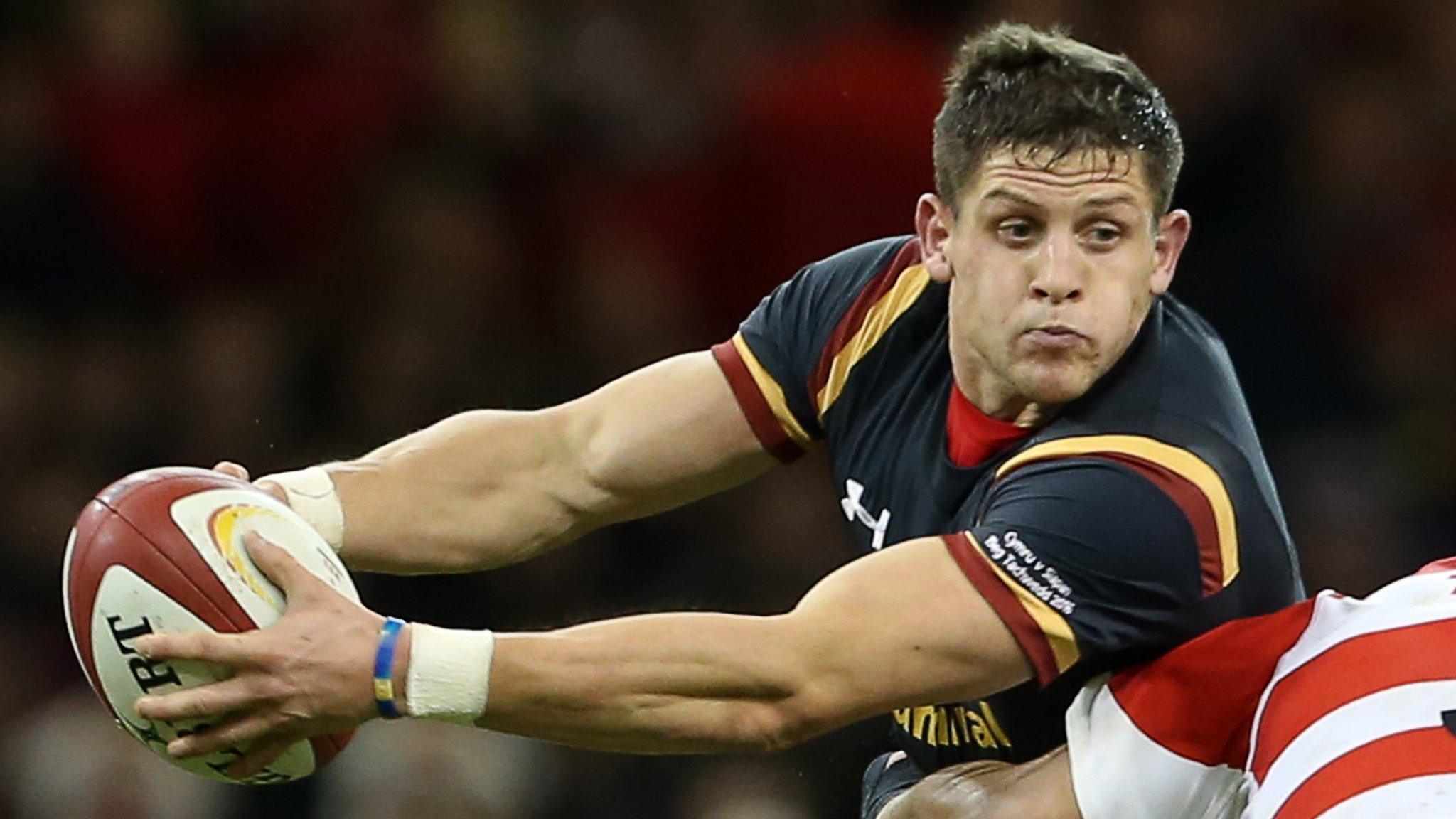 Lloyd Williams is tackled playing for Wales against Japan in 2016