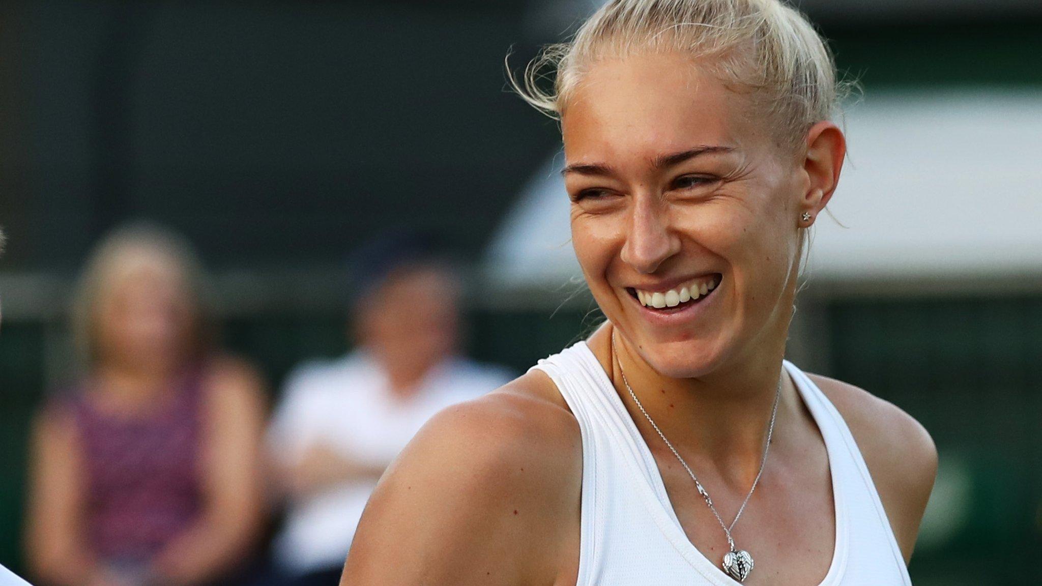 Jocelyn Rae smiles after winning a point at Wimbledon in 2017