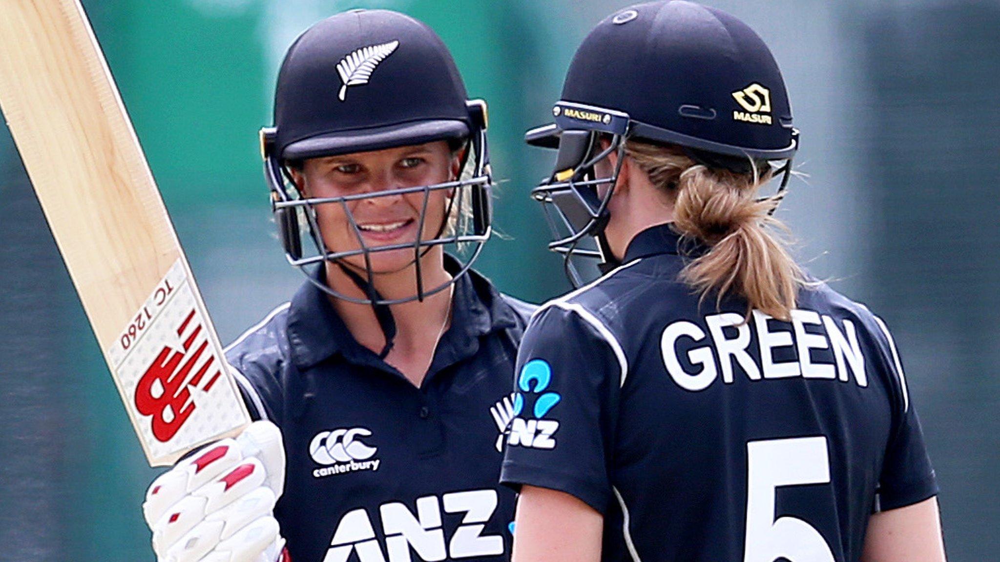 New Zealand captain Suzie Bates celebrates her century against Ireland with Maddy Green