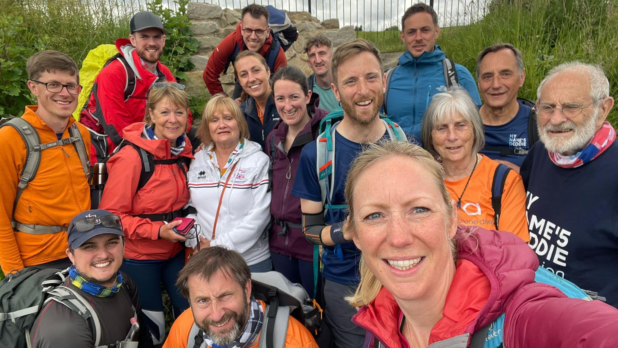 Family and friends with Dr Hames-Brown and Kate, his wife, along Hadrian's Wall