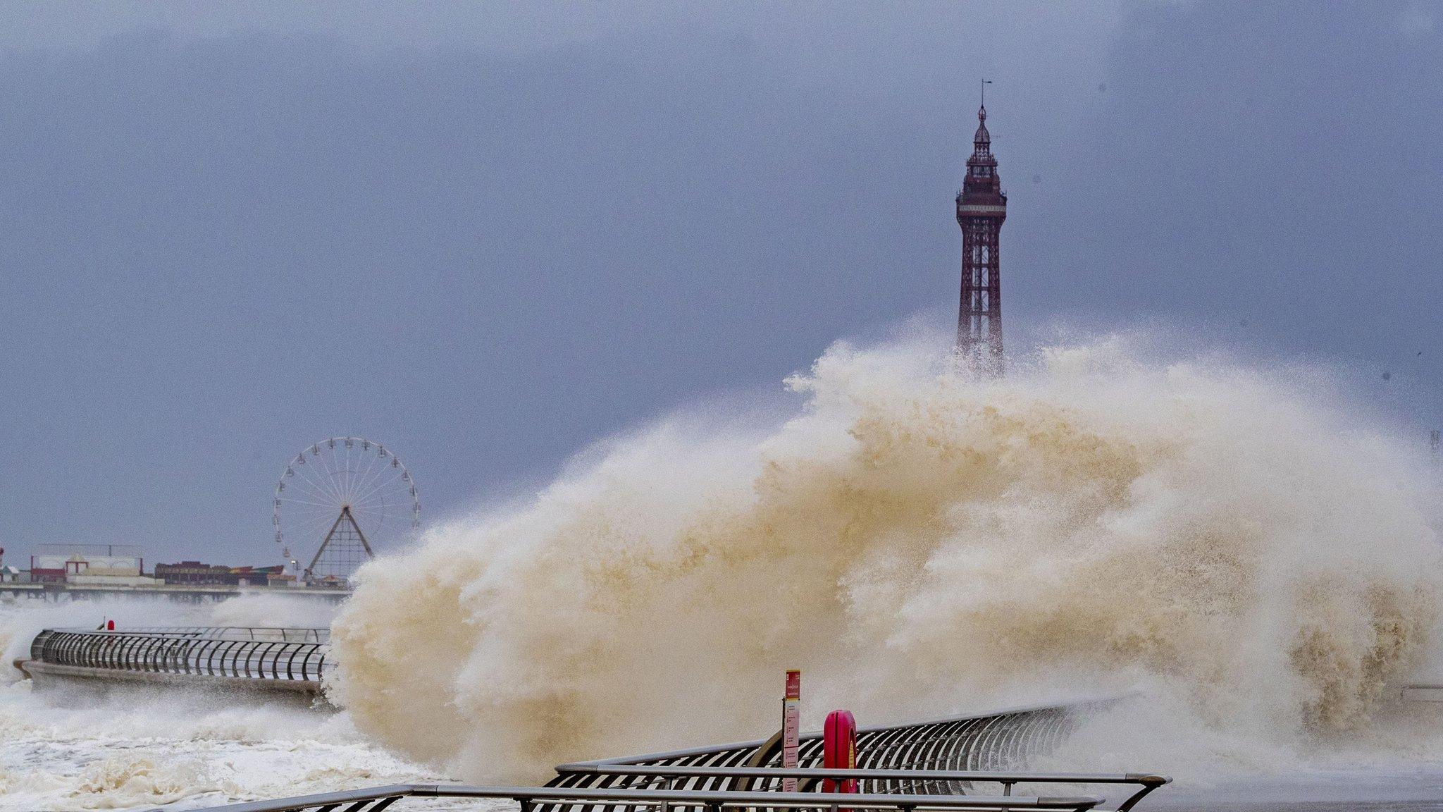 Waves crash over the Blackpool tower