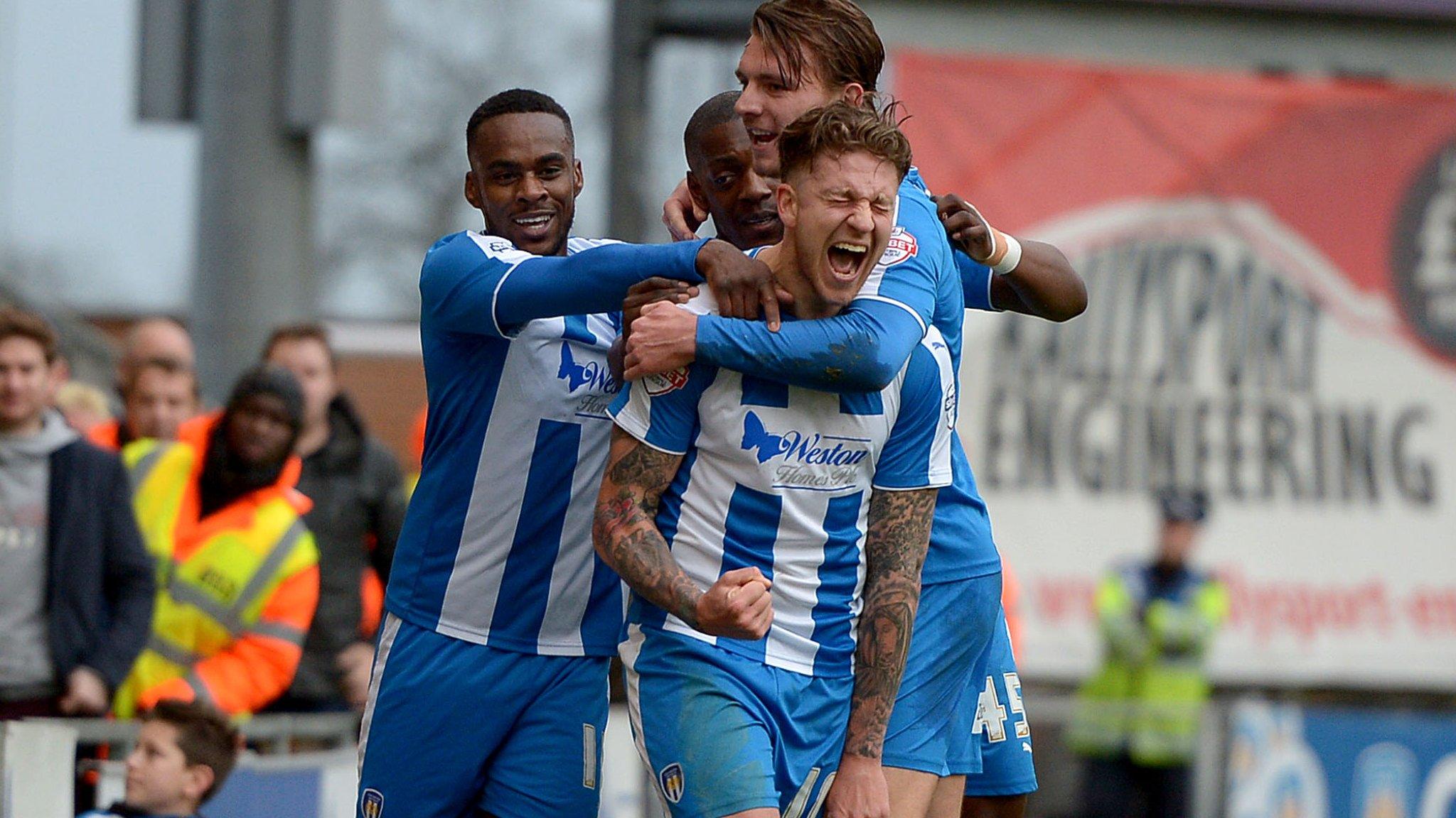 Colchester United celebrate George Moncur's goal against Charlton