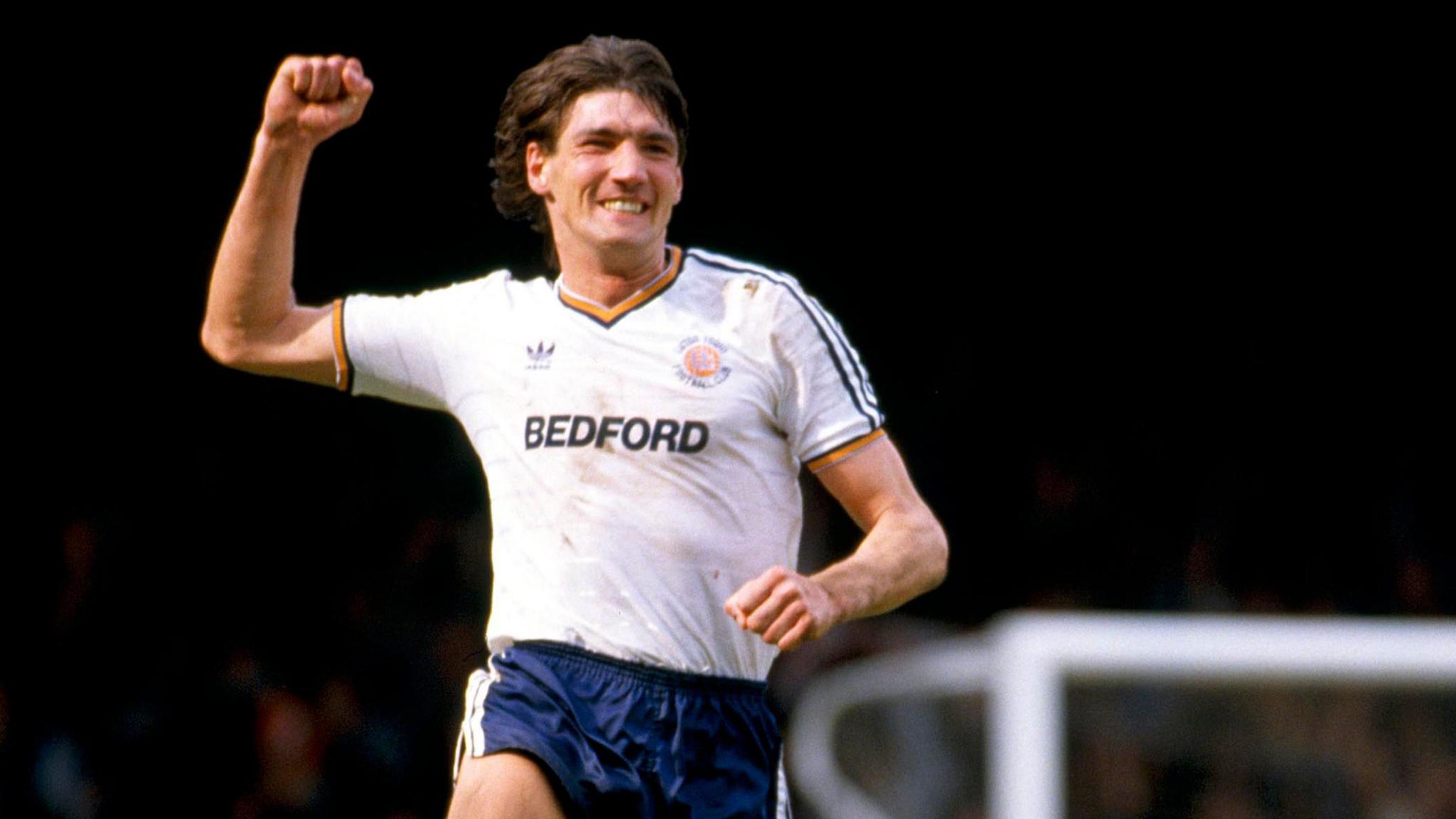 Mick Harford leaping in the air as a Luton player in the 1980s