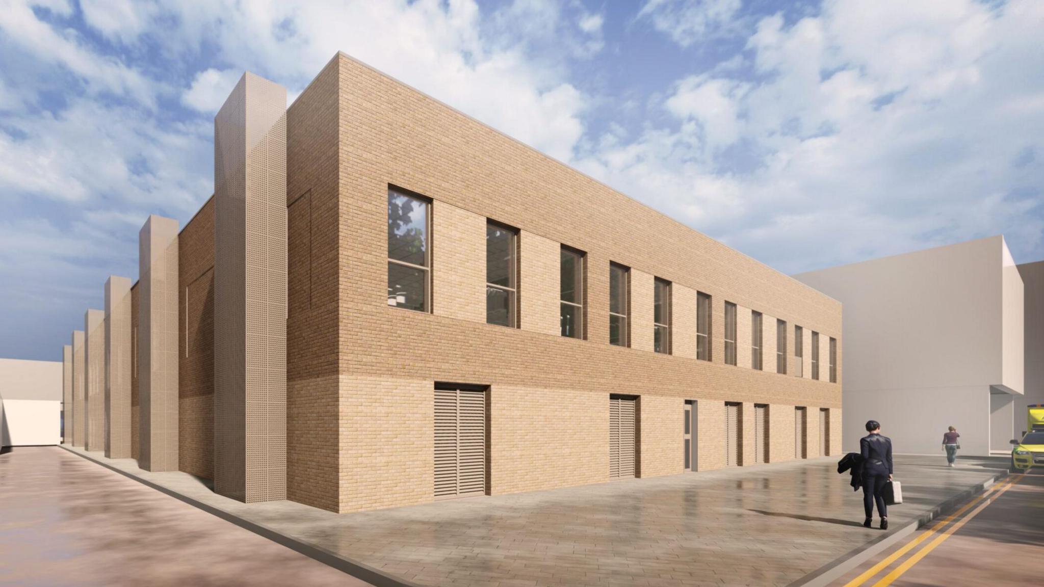 Computer generated design of what the new building may look like. A two storey high boxy building made of light brown brick lined with a row rectangular windows at its front and multiple entrances