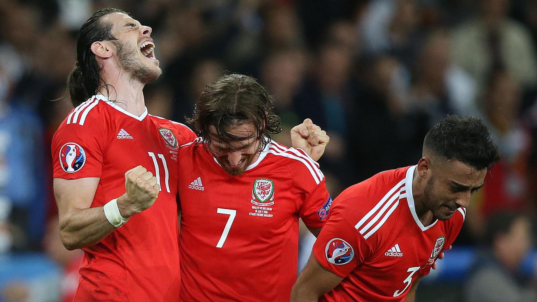 Joe Allen (centre) celebrates Wales' win over Belgium at Euro 2016 with Gareth Bale (left) and Neil Taylor